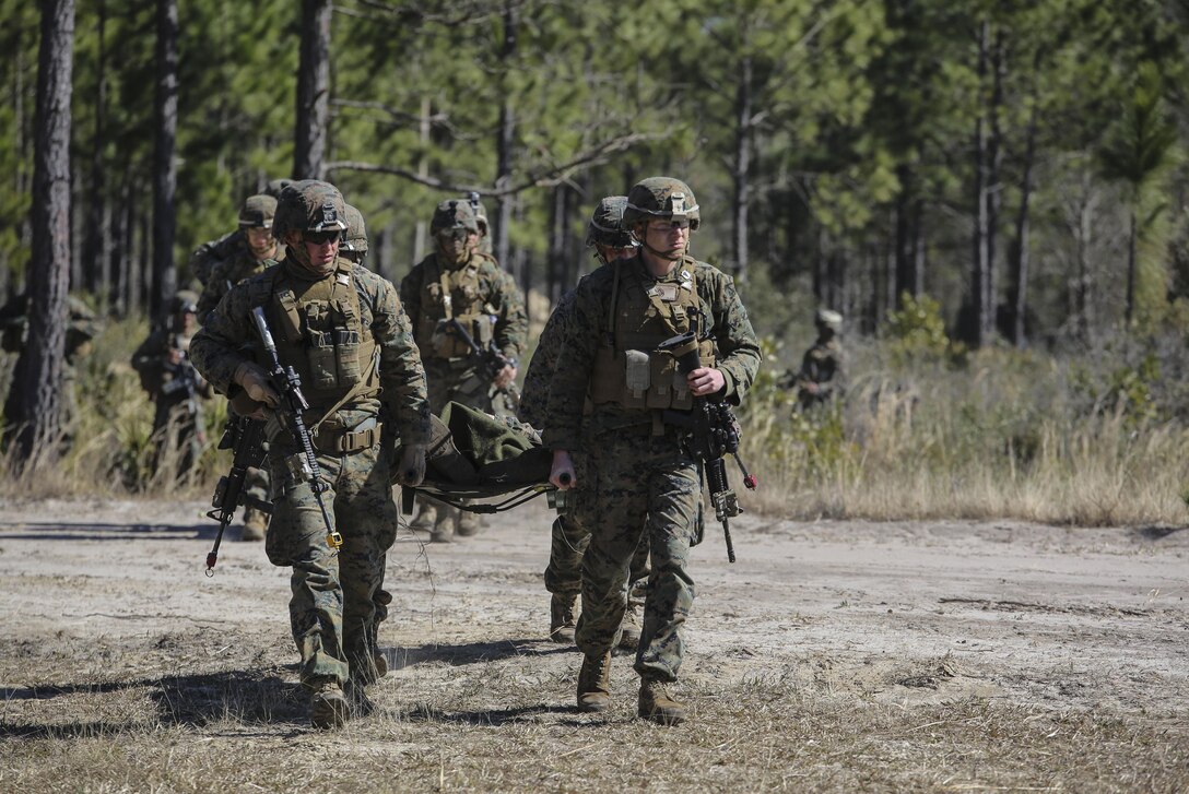 Marines with India Company, 3rd Battalion, 6th Marine Regiment, conduct a simulated casualty evacuation as part of exercise Eager Response at Fort Stewart, Ga., Feb. 26, 2016. The battalion conducted the training with the support of a CH-53E Super Stallion operated by Marines with Marine Heavy Helicopter Squadron 366. During Exercise Eager Response, Marines trained in events such as casualty evacuation, assault support missions and aerial refueling, proving the Marine Air-Ground Task Force is a highly effective combat force.  (U.S. Marine Corps photo by Cpl. Paul S. Martinez/Released)