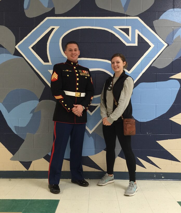 Makayla G. Cessna, a poolee with Marine Corps Recuiting Sub-Station Wilmington, poses for a photo at South Brunswick High School in Southport, North Carolina, with her recruiter, Sgt. Christopher Rocha, Jan. 27, 2016. Cessna, a 17-year old South Brunswick High School graduate, finished school early to join the Marine Corps.  (Photo Courtesy of Sgt. Christopher Rocha)