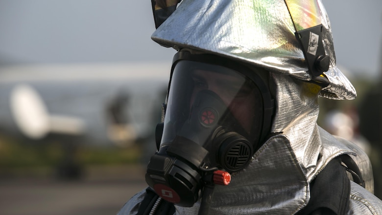 Sgt. Joshua J. Diskin waits for the order to move in with hand lines to put out spot fires in the cargo area of the aircraft after roof turrets put out the majority of the flames during a training event as part of Exercise Cobra Gold 16 at Utapao, Thailand, Feb. 19, 2016. U.S. Marines and Royal Thai Sailors worked together to improve their rescue and firefighting skills. Diskin, from Uda, Texas, is an aircraft rescue and firefighter with Marine Wing Support Squadron 172, Marine Aircraft Group 36, 1st Marine Aircraft Wing, III Marine Expeditionary Force.