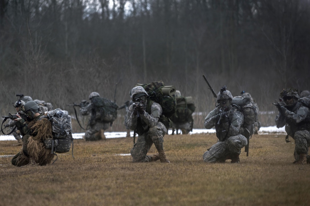 Soldiers provide security after being inserted at a landing zone at the Youngstown Local Training Area in Youngstown, N.Y., Feb. 20, 2016. New York Air National Guard photo by Staff Sgt. Ryan Campbell