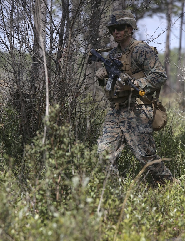 A Marine with 3rd Battalion, 6th Marine Regiment, patrols the area upon the start of exercise Eager Response at Fort Stewart, Ga., Feb. 25, 2016. The battalion was transported from Marine New River, N.C., to the U.S. Army training area via MV-22 Ospreys and CH-53E Super Stallions assigned to the 2nd Marine Aircraft Wing. During Exercise Eager Response, Marines trained in events such as casualty evacuation, assault support missions and aerial refueling, proving the Marine Air-Ground Task Force is a highly effective combat force. (U.S. Marine Corps photo by Cpl. Paul S. Martinez/Released)