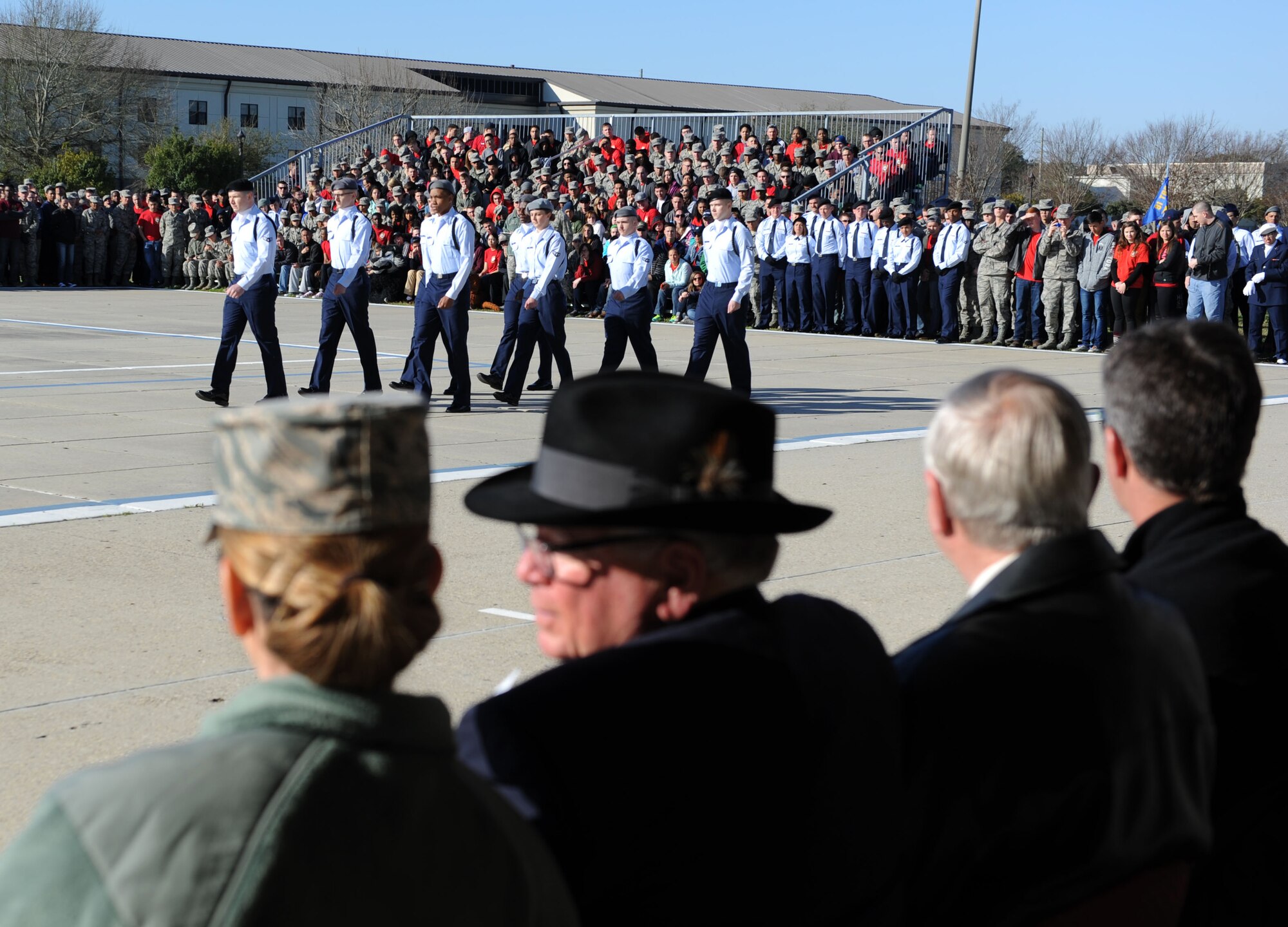 Members of the 335th Training Squadron regulation drill team perform during the 81st Training Group drill down at the Levitow Training Support Facility drill pad Feb. 26, 2016, Keesler Air Force Base, Miss. The 335th TRS “Bulls” placed second in regulation. (U.S. Air Force photo by Kemberly Groue)