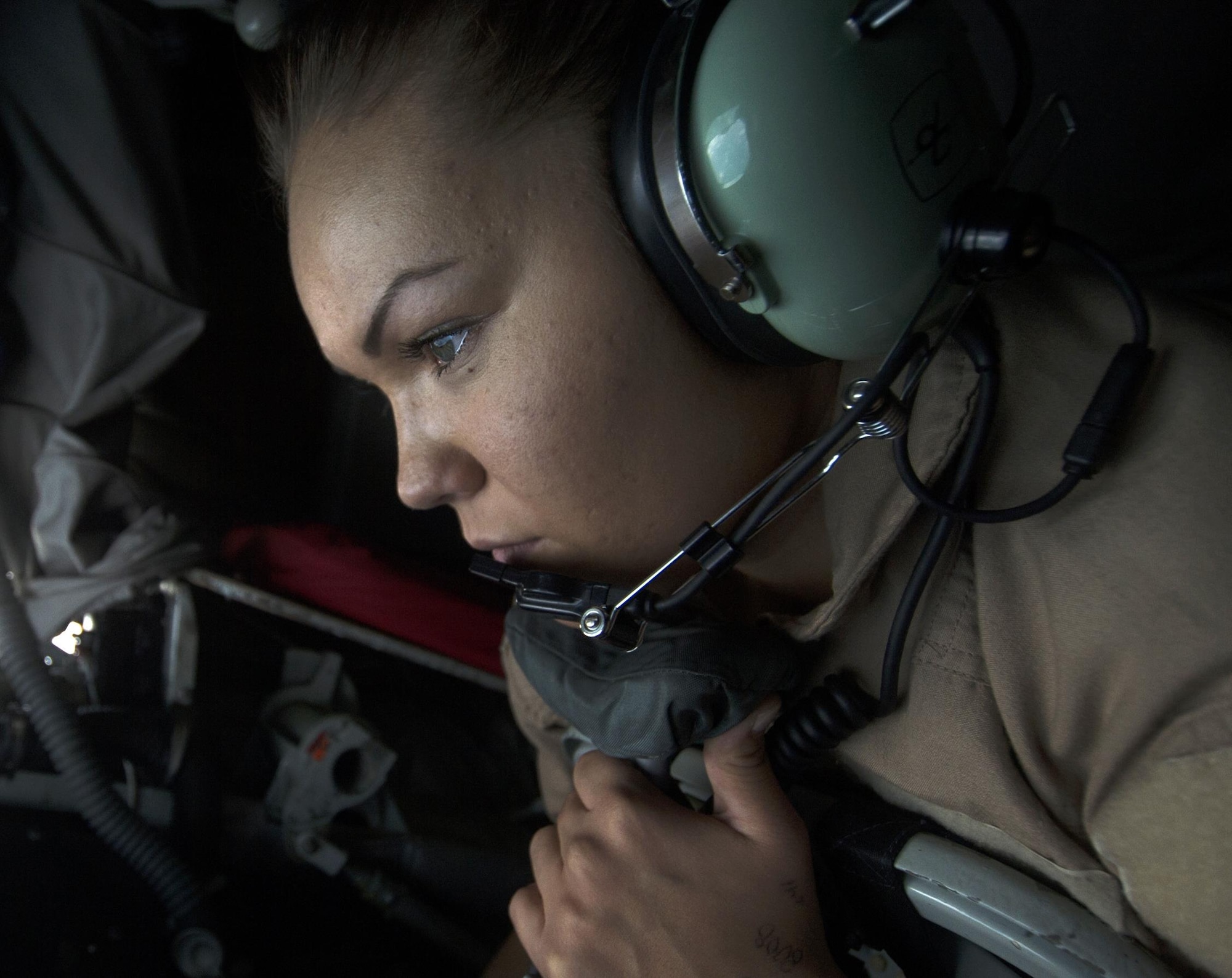 U.S. Air Force Airmen 1st Class Shelby Bowling, 340th Expeditionary Air Refueling Squadron boom operator, refuels a U.S. Marine Corps AV-8B Harrier II over Iraq in support of Operation Inherent Resolve, Dec. 31, 2015.  The 340th EARS reached a significant milestone for 2015 by flying more than 100,000 combat hours before the new year. (U.S. Air Force photo by Tech. Sgt. Nathan Lipscomb)