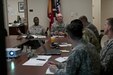 U.S. Army Reserve Soldiers with the 961st Engineer Battalion, provide a command update brief to Lt. Col. Maynard Spell, commander, 961st Engineer Battalion, during the 961st Engineer Battalion's third Defense Support of Civil Authorities tabletop exercise in Seagoville, Texas, Feb. 25 to 28. (U.S. Army photo by Staff Sgt. Debralee Best)
