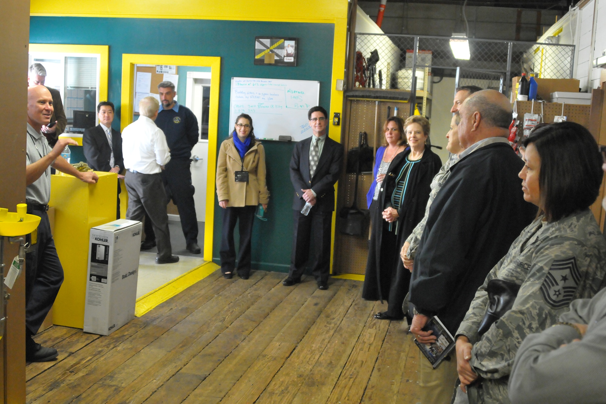 Military and civic leaders from San Angelo, Texas and Goodfellow Air Force visited the Presidio of Monterey toured maintenance facilities on the installation while exploring the Monterey, California Army installation's unique civic partnerships. Pictured here, visitors tour a supply center used by City of Monterey maintenance workers while performing buildings maintenance on thee Army post. Military and civic leaders from San Angelo, Texas and Goodfellow Air Force visited the Presidio of Monterey to explore the Monterey, California Army installation's unique civic partnerships. The Monterey Model saves the Army money by sharing resources with the nearby cities of Seaside and Monterey, California, where possible for common municipal and city services, such as public works and safety. A 2000 Army Audit Agency review validated the cost savings, confirming Presidio of Monterey saved 41% over the cost of reimbursements to the Navy (which also operates a small military installation in the area) under a previous agreement, a total savings of more than $2.5 million annually. (courtesy photo)