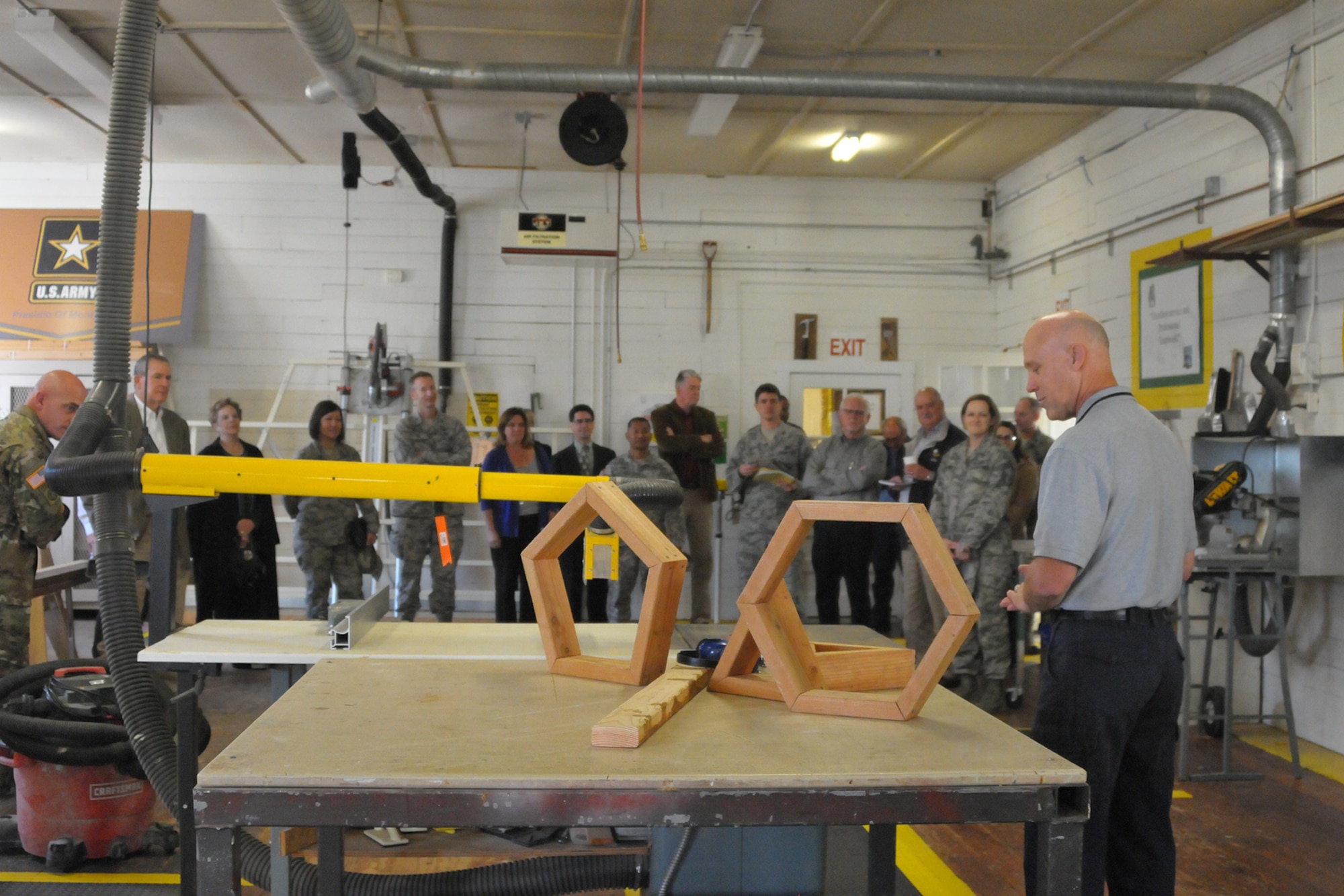 Jon Anderson, a City of Monterey maintenance supervisor, demonstrates one of the evaluations candidates might experience when being considered for employment supporting the city's maintenance contract on the Presidio of Monterey, an Army installation in Monterey California. In addition to screening for technical competence and safety habits, "we value problem solvers," he said. Military and civic leaders from San Angelo, Texas and Goodfellow Air Force visited the Presidio of Monterey to explore the Monterey, California Army installation's unique civic partnerships. The Monterey Model saves the Army money by sharing resources with the nearby cities of Seaside and Monterey, California, where possible for common municipal and city services, such as public works and safety. A 2000 Army Audit Agency review validated the cost savings, confirming Presidio of Monterey saved 41% over the cost of reimbursements to the Navy (which also operates a small military installation in the area) under a previous agreement, a total savings of more than $2.5 million annually. (courtesy photo)