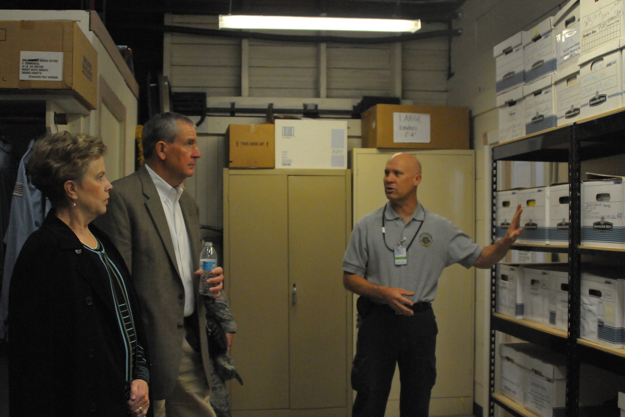 Jon Anderson, a City of Monterey maintenance supervisor, shows visiting civic leaders the city's maintenance record archive inside it's customer service center on the Presidio of Monterey, an Army installation in Monterey California. Military and civic leaders from San Angelo, Texas and Goodfellow Air Force visited the Presidio of Monterey to explore the Monterey, California Army installation's unique civic partnerships. The Monterey Model saves the Army money by sharing resources with the nearby cities of Seaside and Monterey, California, where possible for common municipal and city services, such as public works and safety. A 2000 Army Audit Agency review validated the cost savings, confirming Presidio of Monterey saved 41% over the cost of reimbursements to the Navy (which also operates a small military installation in the area) under a previous agreement, a total savings of more than $2.5 million annually. (courtesy photo)