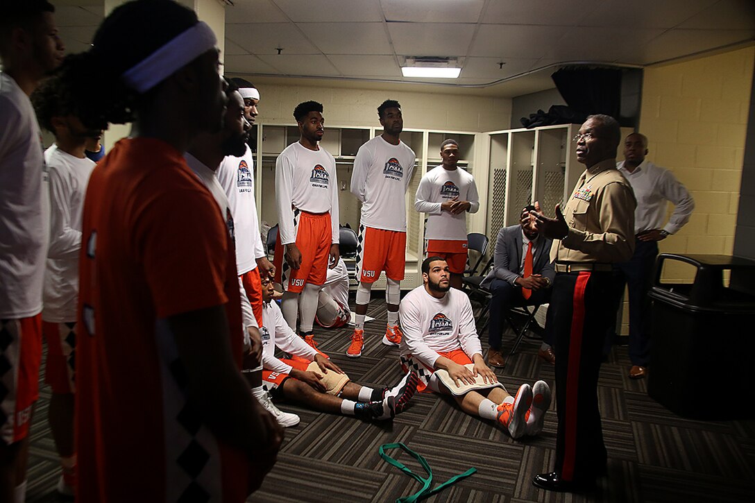 Lt. Gen. Ronald L. Bailey, Deputy Commandant Plans, Policies, and Operations, speaks with the Virginia State University men’s basketball team before the championship game of the CIAA at the Time Warner Cable Arena in Charlotte, N.C., Feb. 27, 2016. The Marines are present at the Central Intercollegiate Athletic Association championships to spread awareness to student athletes and fans about opportunities in the Marine Corps. (Official Marine Corps photo by Cpl. John-Paul Imbody)