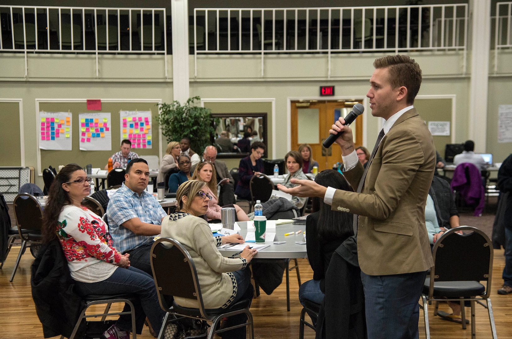 Nate Burke, Green Dot senior trainer, addresses military and civilian participants during Green Dot training Feb. 25 at Joint Base San Antonio- Lackland’s Arnold Hall. Green Dot is the Air Force’s first step in arming Airmen for violence prevention.