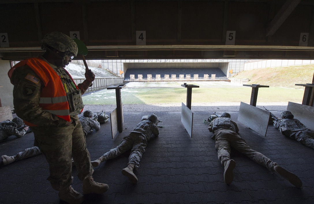 Soldiers prepare to fire M16 rifles during a weapons qualification test at a military shooting range in Landstuhl, Germany, Feb. 25, 2016. DoD photo by Air Force Tech. Sgt. Brian Kimball