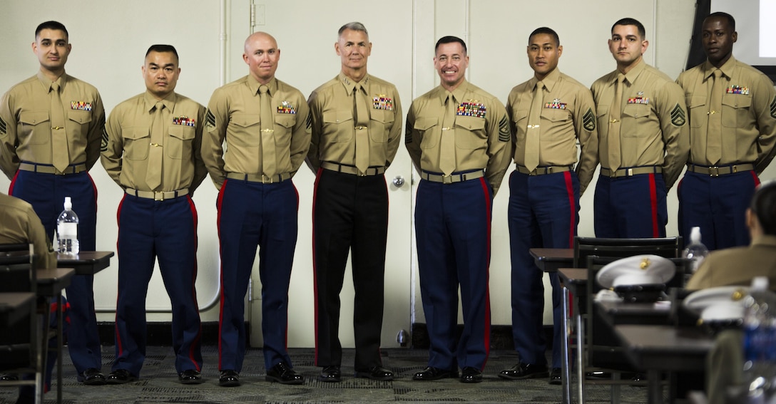 Lt. Gen. Rex C. McMillian (center left), commander of Marine Forces Reserve and Marine Forces North, and Sgt. Maj. Anthony A. Spadaro (center right), sergeant major Marine Forces Reserve and Marine Forces North, poses with Marines nominated for Reserve Career Planner of the Year during the Reserve Career Planner Awards presentation at Marine Corps Recruit Depot San Diego, Calif., Feb. 24, 2016. This year’s Reserve Career Planner of the Year was Sgt. Christopher Smith (left), a career planner from 3rd Air Naval Gunfire Liaison Company, Force Headquarters Group, Marine Forces Reserve and the runner-up was Staff Sgt. Andrew Watson, a career planner from 4th Light Armored Reconnaissance Battalion, 4th Marine Division, Marine Forces Reserve. Smith, Watson and other career planners work diligently through the year to assist Marines with making future occupational decisions. 