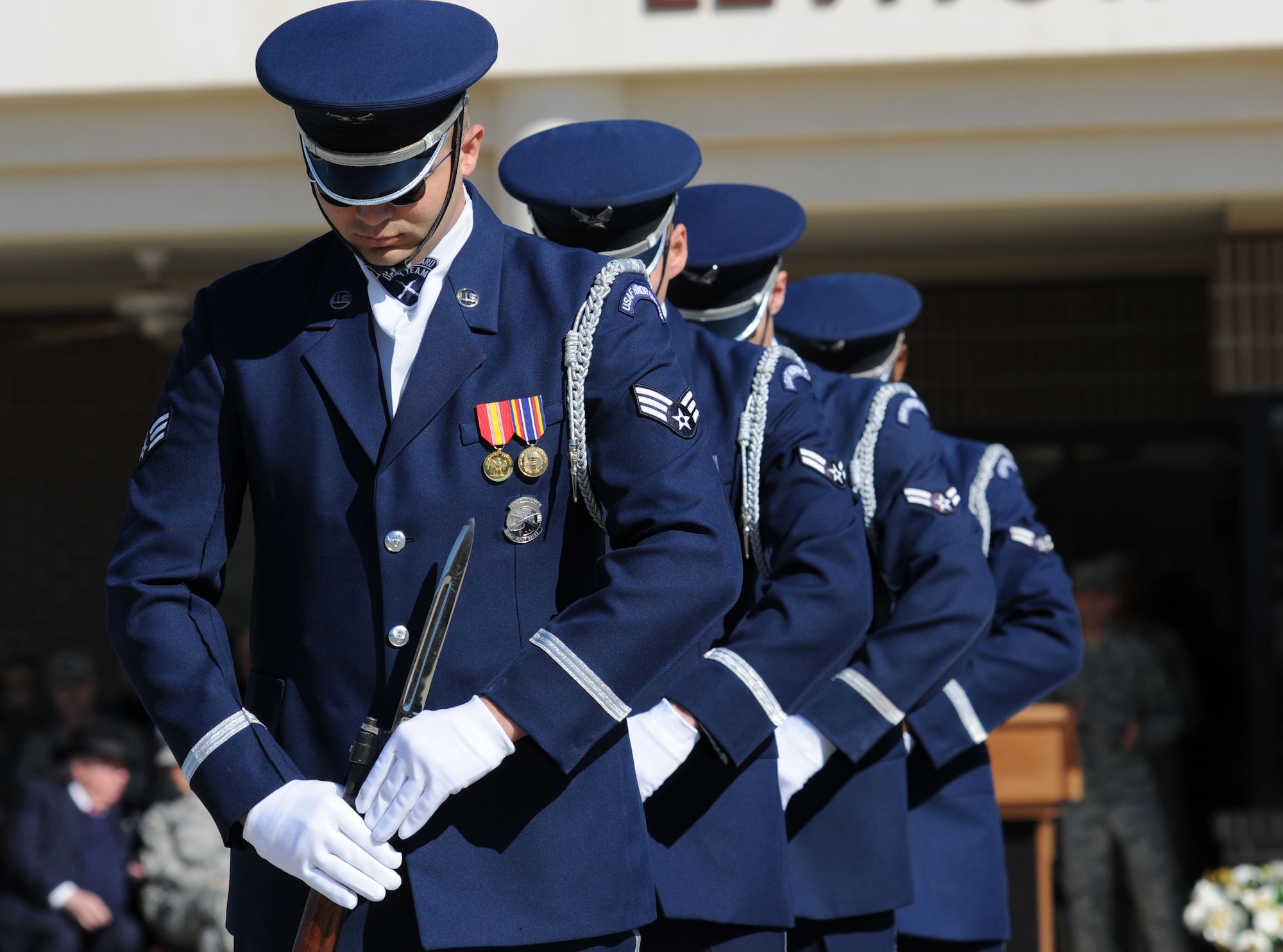 The U.S. Air Force Honor Guard Drill Team performs a new routine on the Levitow Training Support Facility drill pad Feb. 26, 2016, Keesler Air Force Base, Miss. During the past month, the team developed the routine to be used throughout the year. (U.S. Air Force photo by Kemberly Groue)