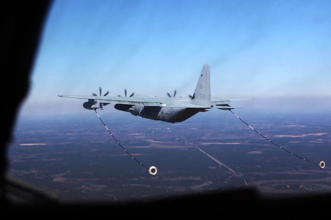 A KC-130J Super Hercules conducts aerial refueling missions during Exercise Eager Response at Marine Corps Air Station Beaufort, S.C., Feb. 25, 2016. During the exercise, Marines trained in events such as casualty evacuation, assault support missions and aerial refueling, proving the Marine Air-Ground Task Force is a highly effective combat force. (U.S. Marine Corps photo by Pfc. Nicholas P. Baird/Released)