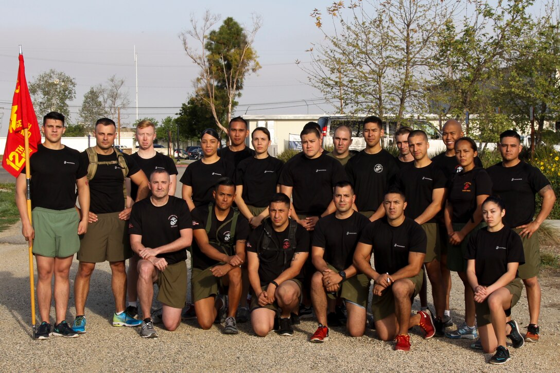 Marines from Marine Corps Recruiting Station Orange County pose after conducting a physical training session aboard Naval Weapons Station Seal Beach, Calif., Feb. 26, 2016. 