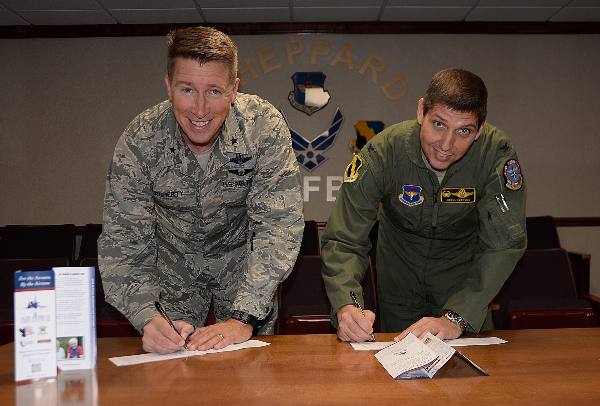 Brig. Gen. Patrick Doherty, 82nd Training Wing commander, and Col. Gregory Keeton, 80th Flying Training Wing commander, officially began the campaign Feb. 29 when they signed up to make contributions this year. Sheppard Air Force Base's goal is to reach $77,505 in the five-week campaign. (U.S. Air Force photo/Senior Airman Robert L. McIlrath)