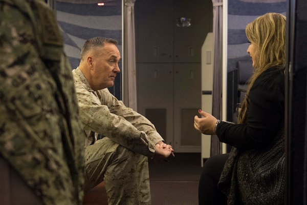 Marine Corps Gen. Joseph F. Dunford Jr., chairman of the Joint Chiefs of Staff, talks with Jane Horton, a Gold Star wife, en route to Kabul, Afghanistan, March 1, 2016. Dunford is visiting Afghanistan to meet with senior military and civilian leaders, and attend the Resolute Support and U.S. Forces Afghanistan change-of-command ceremony. DoD photo by D. Myles Cullen