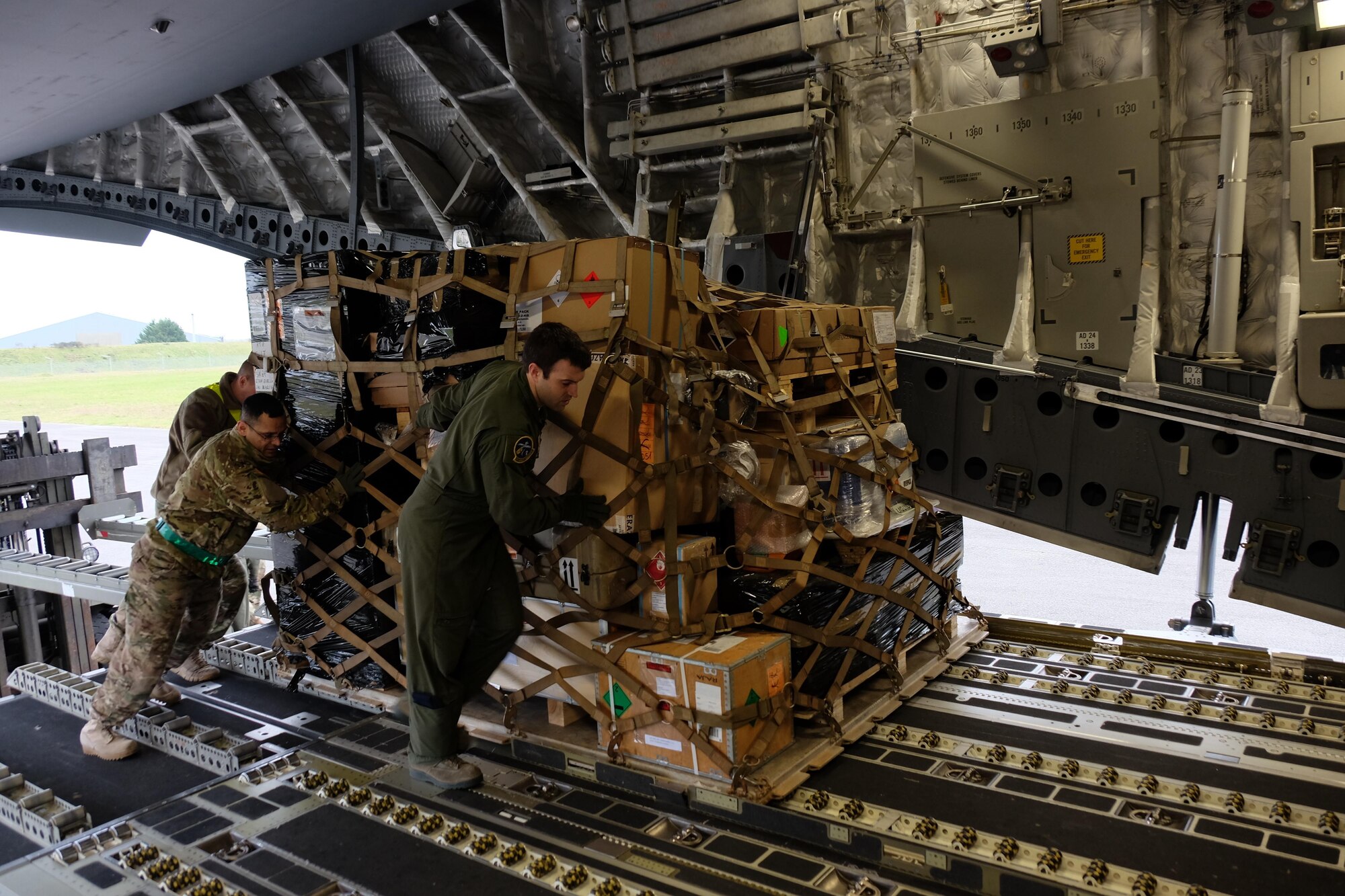 U.S. Army Reservists load pallets onto a C-17 from Joint Base Charleston, South Carolina during a joint partnered movement control  mission with French Air Force members Feb. 22, 2016. This mission is  in support of United States Africa Command’s Operation Echo Casemate resupply mission to French military forces deployed to the Central African Republic.  (Photo by Sgt. 1st Class Matthew Chlosta)


