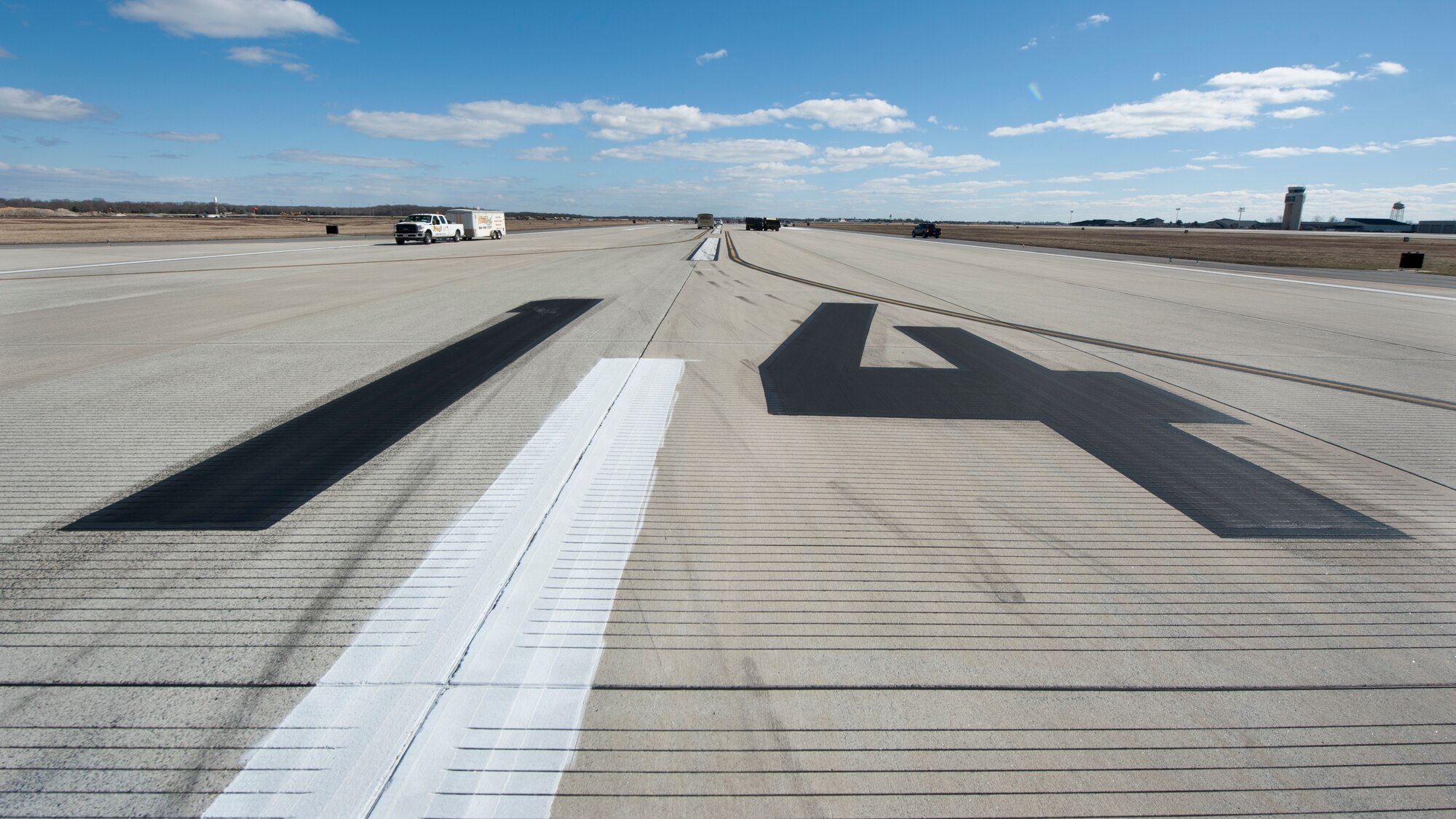 Runway 14-32’s “14” markings are blacked-out Feb. 26, 2016, on Dover Air Force Base, Del. This runway is temporarily being shortened due to an ongoing construction project on Runway 01-19. (U.S. Air Force photo/Senior Airman Zachary Cacicia)