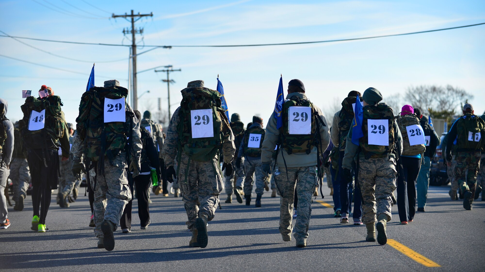 A team of 436th Security Forces Squadron members compete in the 436th SFS 17th Annual Korean War Ruck March Feb. 27, 2016, at Dover Air Force Base, Del. Approximately 130 contestants from Team Dover, the Delaware State Police and Junior Reserve Officers’ Training Corps formed four-man teams that rucked a 6.2 mile course. (U.S. Air Force photo/Tech. Sgt. Elizabeth Morris)