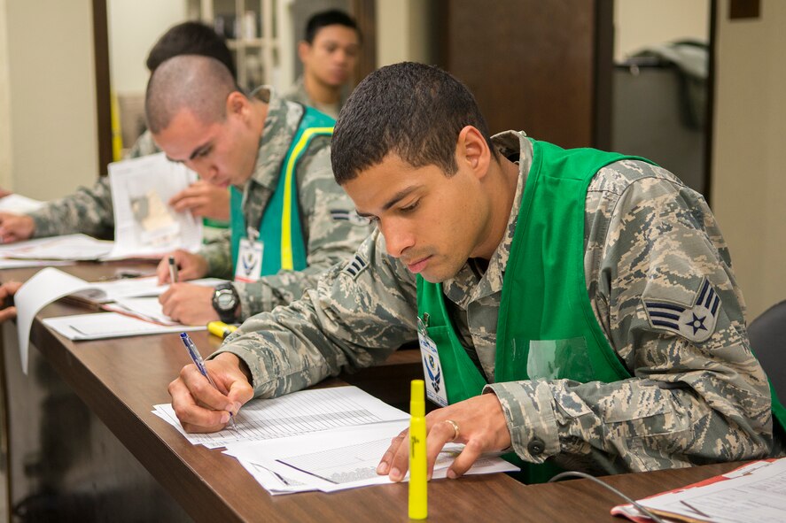 Airmen from the 7th Bomb Wing man the Deployment Control Center processing line Feb. 23, 2016, at Dyess Air Force Base, Texas, during a B-1 Combat Mission Effectiveness exercise. The DCC is a one-stop shop for Airmen issued a short-notice deployment tasking to ensure they are fully qualified to deploy. Part of the plan for the B-1 CME exercise was to task Airmen in operations, maintenance and support positions to deploy within 48 hours.  (U.S. Air Force photo by Airman 1st Class Austin Mayfield/Released)