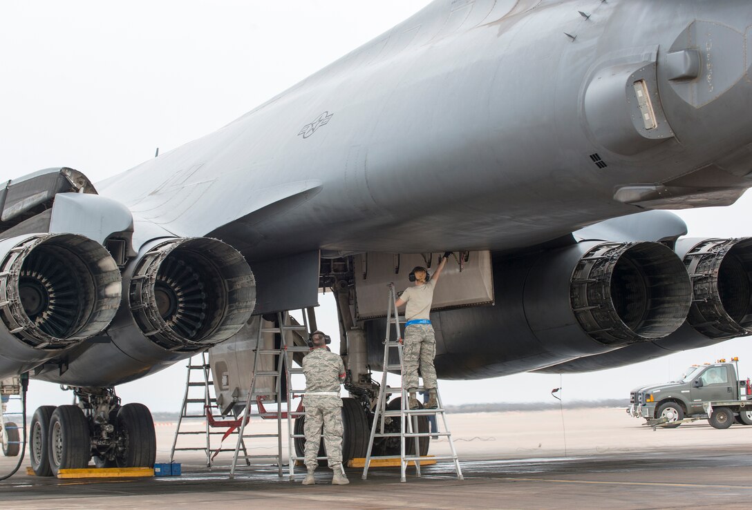 Airmen assigned to the 7th Maintenance Group prep a B-1B Lancer’s bomb bay for a Joint Air-to-Surface Standoff Missile Feb. 21, 2016, at Dyess Air Force Base, Texas, during a B-1 Combat Mission Effectiveness Exercise. The exercise challenged Airmen assigned to the 7th Bomb Wing to prepare six B-1s to launch with weapons and deploy the aircraft and personnel within 48 hours. (U.S. Air Force photo by Airman 1st Class Austin Mayfield/Released)
