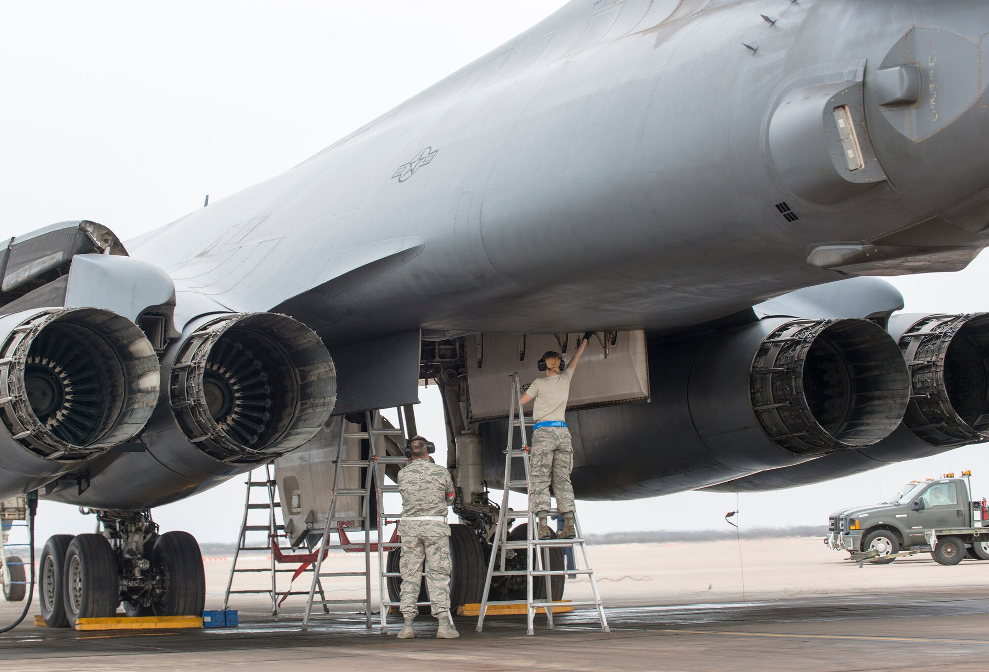 Airmen assigned to the 7th Maintenance Group prep a B-1B Lancer’s bomb bay for a Joint Air-to-Surface Standoff Missile Feb. 21, 2016, at Dyess Air Force Base, Texas, during a B-1 Combat Mission Effectiveness Exercise. The exercise challenged Airmen assigned to the 7th Bomb Wing to prepare six B-1s to launch with weapons and deploy the aircraft and personnel within 48 hours. (U.S. Air Force photo by Airman 1st Class Austin Mayfield/Released)
