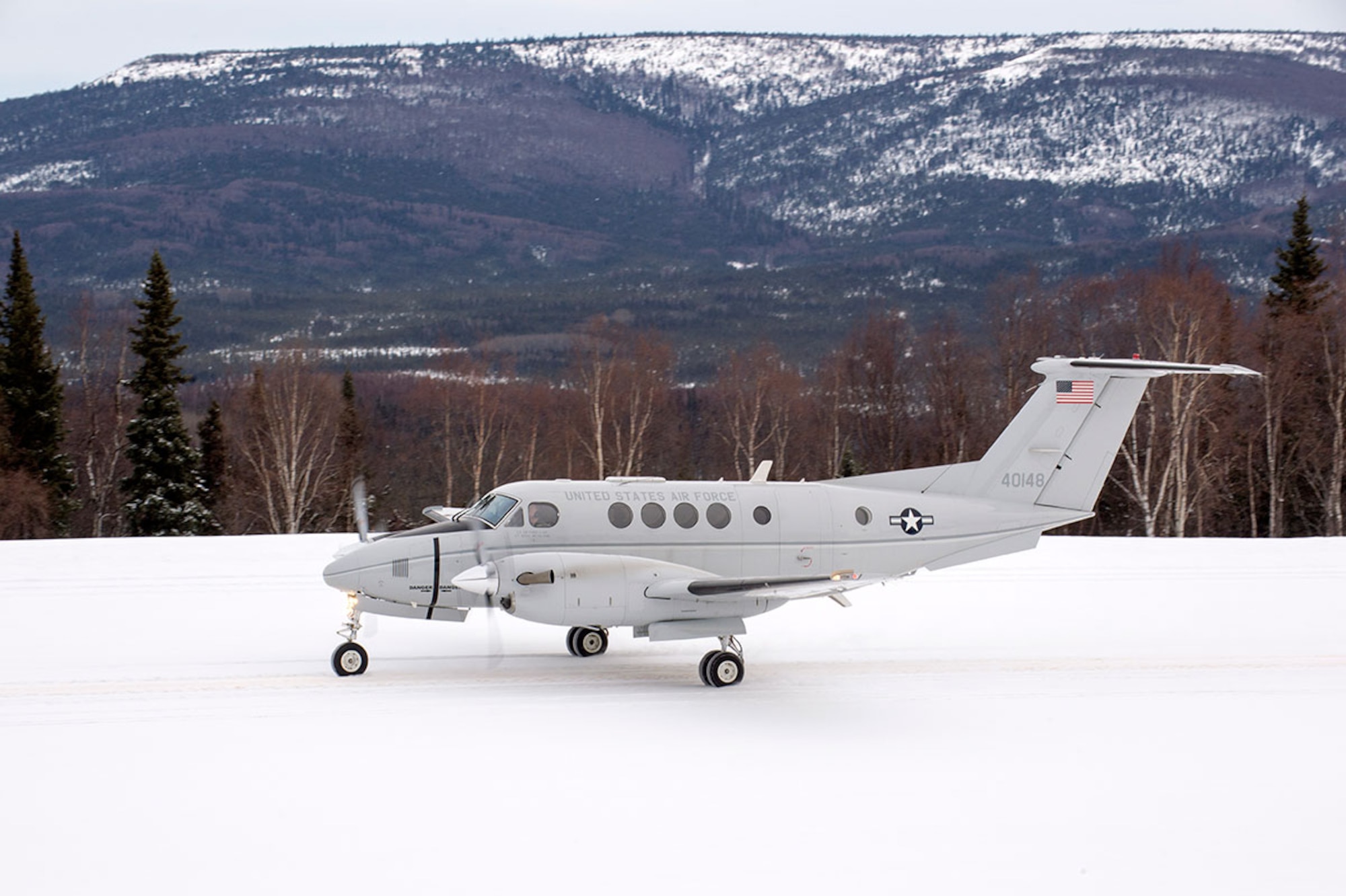 A C-12F Huron assigned to the 517th Airlift Squadron prepares to take off at Tatalina Air Force Station near McGrath, Alaska, Feb. 23, 2016. (U.S. Air Force photo by Staff Sgt. Sheila deVera)