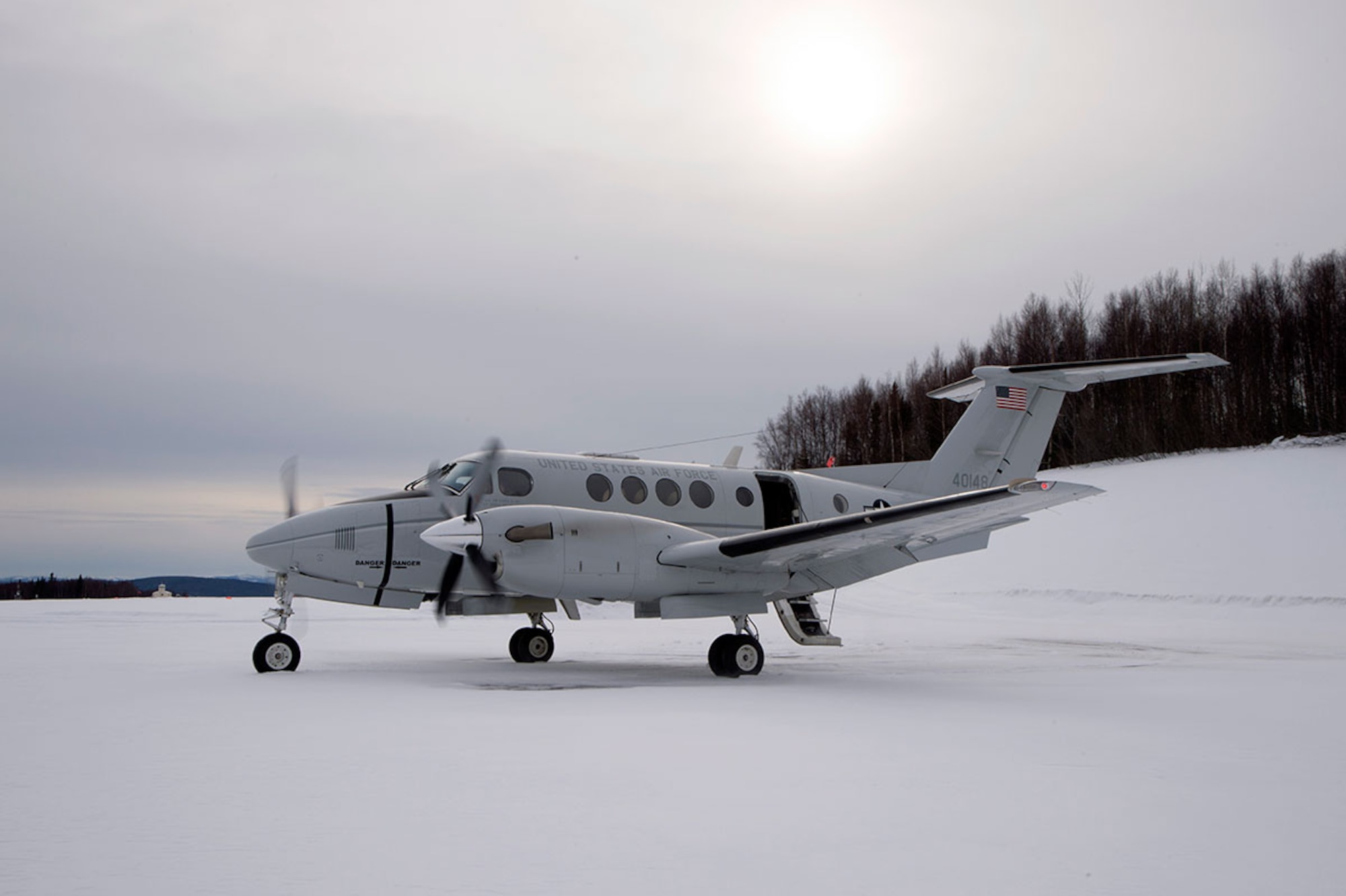 A C-12F Huron assigned to the 517th Airlift Squadron waits for passengers to arrive before taking off at Tatalina Air Force Station near McGrath, Alaska, Feb. 23, 2016. Tatalina is a long-range radar site and remains active as part of the Alaska North American Aerospace Defense Command Region. (U.S. Air Force photo by Staff Sgt. Sheila deVera)
