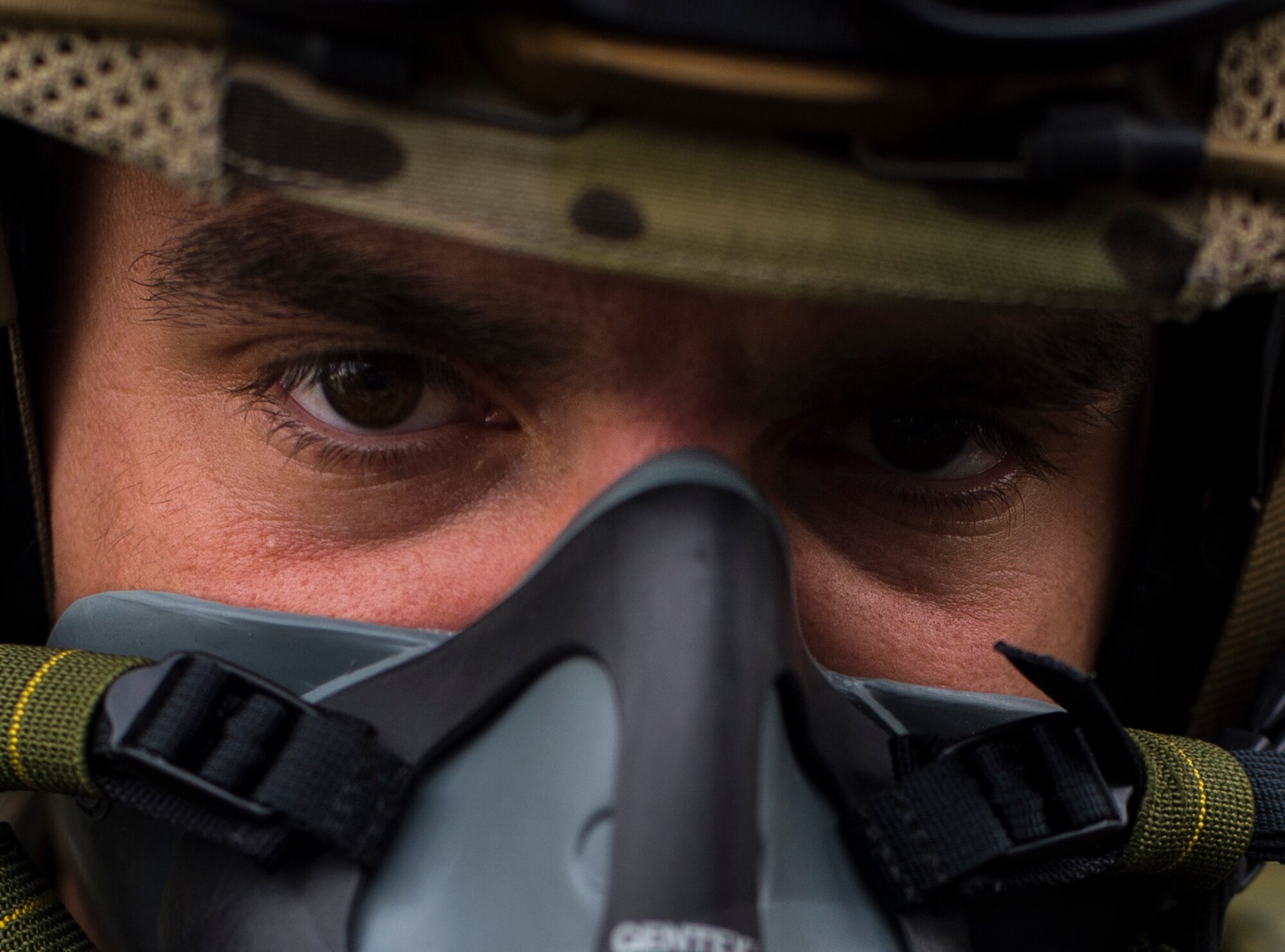Lt. Andre Novais, Portuguese paratrooper, tests his oxygen mask in preparation for a free-fall jump during exercise Real Thaw 16 in Beja, Portugal, Feb. 24, 2016. The paratroopers jumped from approximately 18,000 feet to test their high-altitude free-fall capabilities. (U.S. Air Force photo/Senior Airman Jonathan Stefanko)