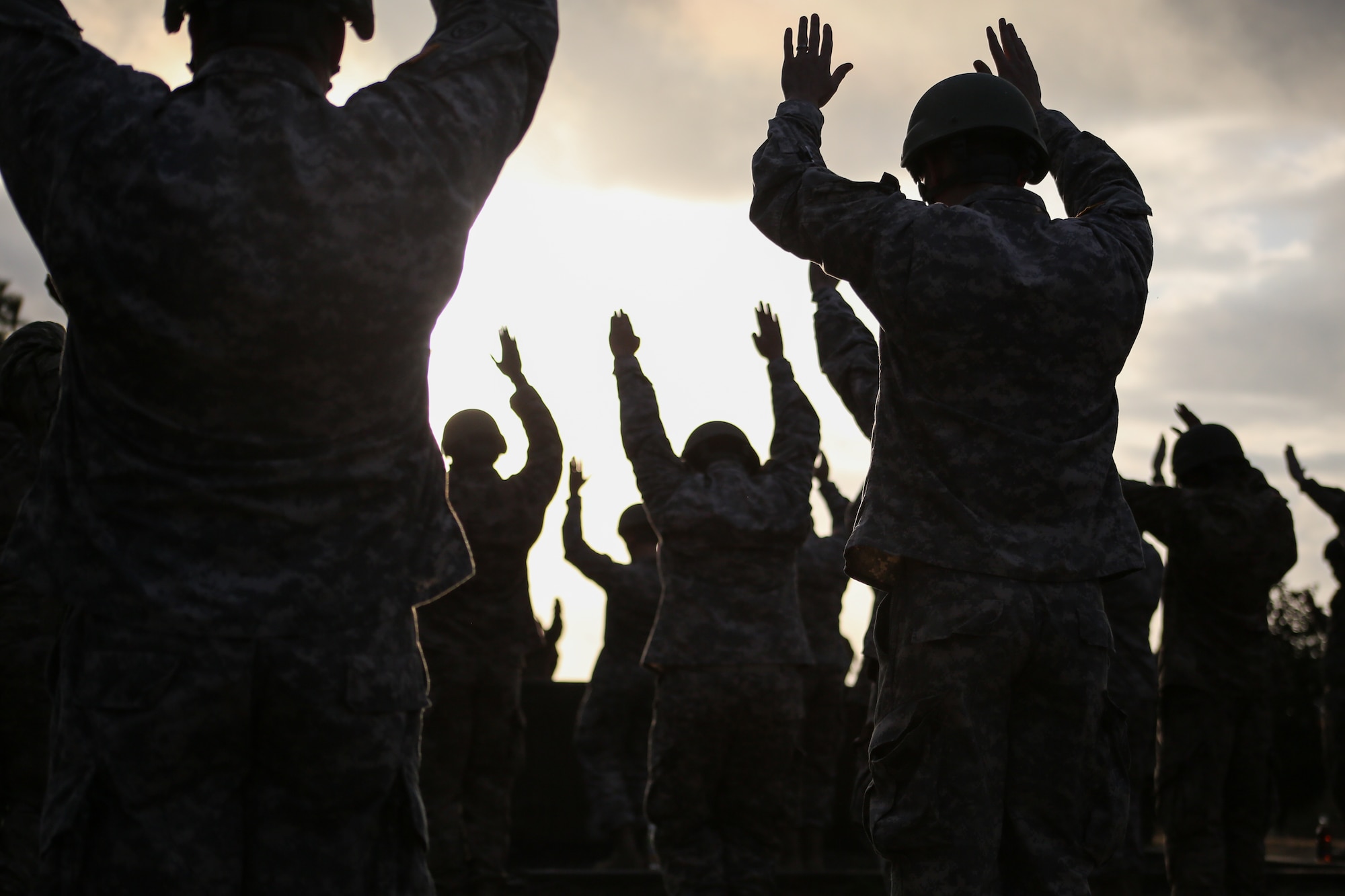 Green Berets and soldiers assigned to the 7th Special Forces Group (Airborne) conduct pre-jump safety training while preparing to conduct a static-line parachute jump Feb. 23.  The soldiers jumped from Army UH-60 Blackhawk helicopters onto an Eglin Air Force Base drop zone to maintain their airborne proficiency.  (U.S. Army photo/Sgt, Sara Wakai)