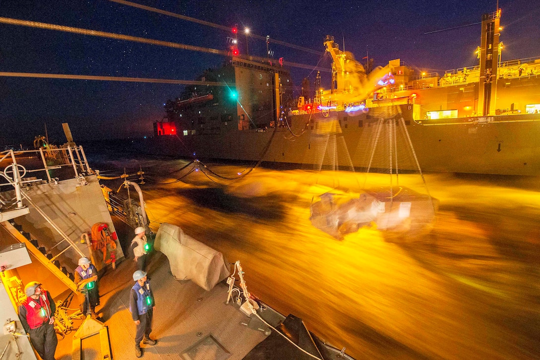 The USS Bulkeley receives fuel and cargo from dry cargo ship USNS Medgar Evers during a replenishment in the Arabian Gulf, Feb. 25, 2016. The guided-missile destroyer is supporting Operation Inherent Resolve, maritime security operations and theater security cooperation efforts in the U.S. 5th Fleet area of operations. U.S. Navy photo by Petty Officer 2nd Class Michael J. Lieberknec