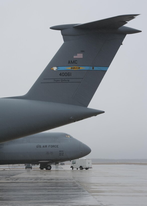 Two C-5M Super Galaxies, operated by the 436th Airlift Wing, sit on the flight line Feb. 24, 2016, at Joint Base McGuire-Dix-Lakehurst, N.J. This fleet of C-5s will temporary operate out of the joint base while their home station, Dover Air Force Base, undergoes runway construction. (U.S. Air Force photo/Senior Airman Zachary Cacicia) 