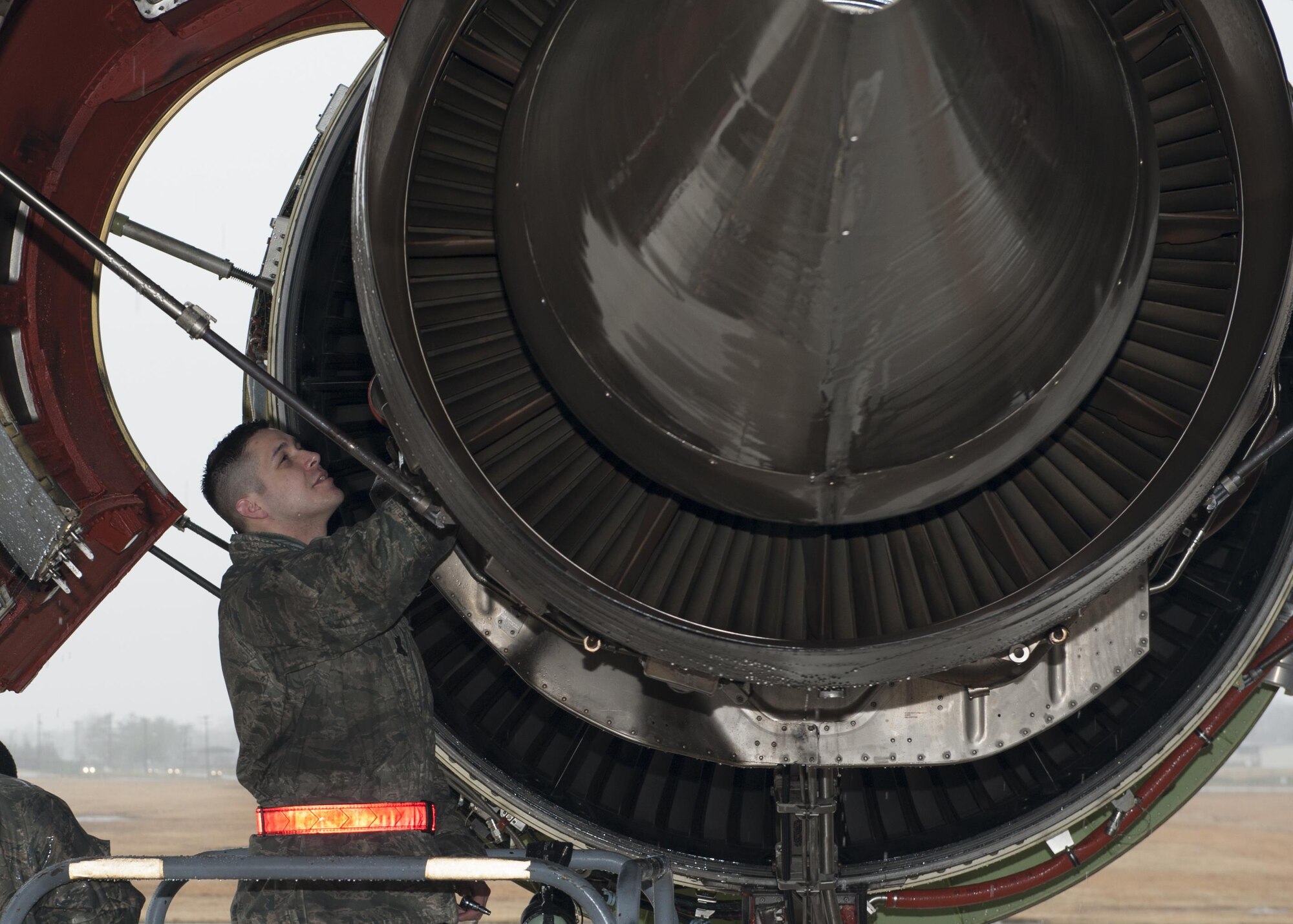 Senior Airman Tyler Garcia, 436th Aircraft Maintenance Squadron electrical and environmental systems journeyman, performs maintenance on a C-5M Super Galaxy jet engine Feb. 24, 2016, on the flight line at Joint Base McGuire-Dix-Lakehurst, N.J. Team Dover maintainers are anticipated to operate at the joint base until August, with a rotation at the halfway point. (U.S. Air Force photo/Senior Airman Zachary Cacicia)
