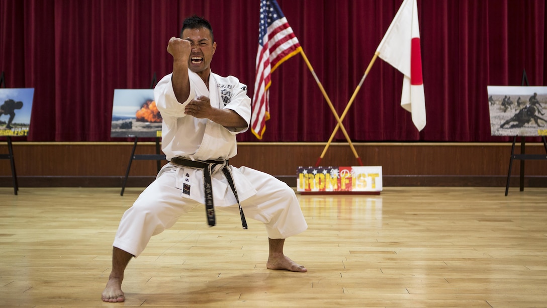 A soldier with Japan Ground Self-Defense Force offers a Karate demonstration for U.S. Marines and other JGSDF soldiers at Marine Corps Base Camp Pendleton, California, March 1, 2016, during the closing ceremony of Exercise Iron Fist 2016. Iron Fist also allows for Marines to train with warriors from a different culture, building camaraderie between the USMC and JGSDF. 
