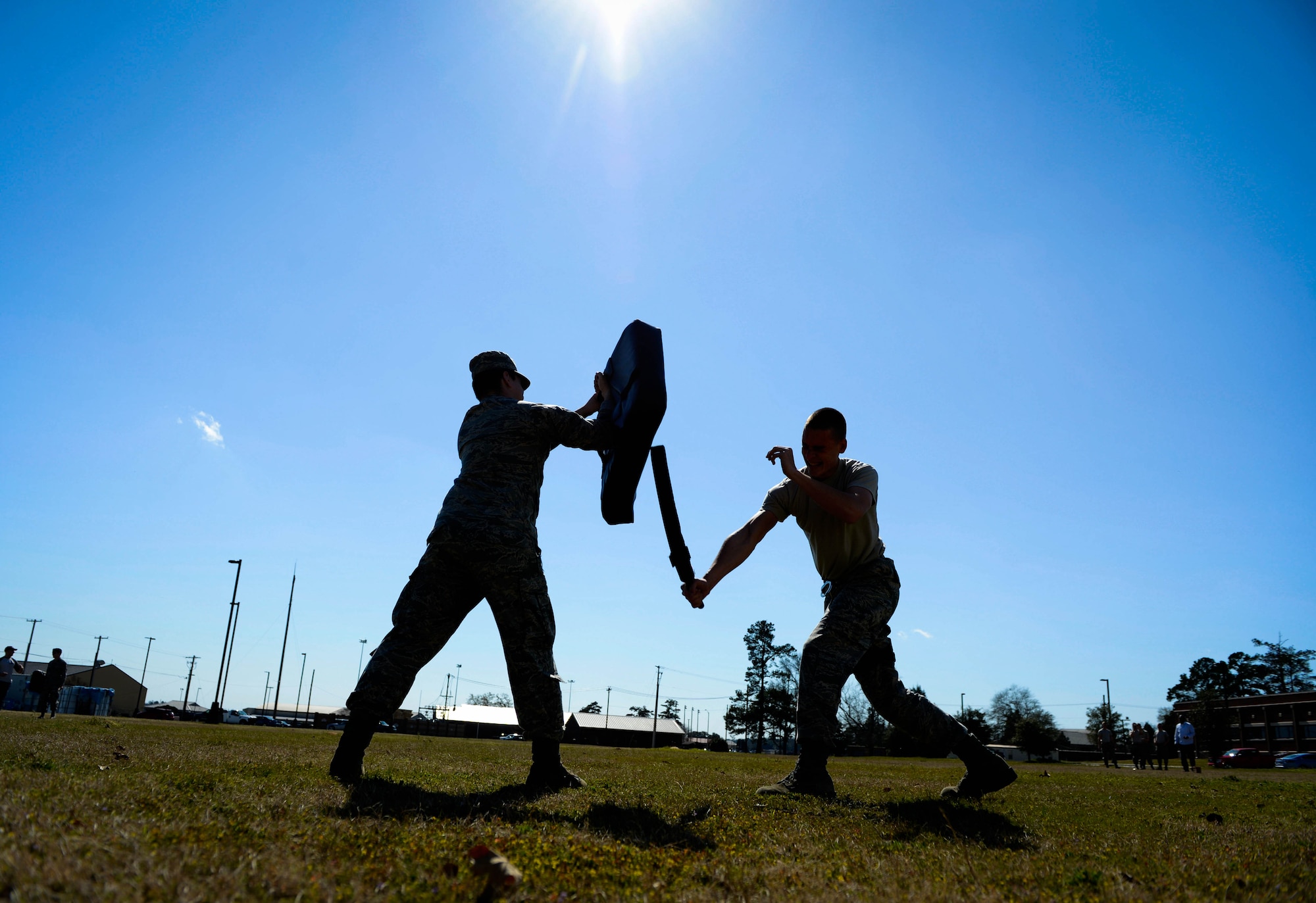 Members of the 20th Security Forces Squadron participate in pepper spray training at Shaw Air Force Base, S.C., Feb. 29, 2016. After pepper spray exposure, Airmen had to detain a simulated perpetrator at four separate stations. (U.S. Air Force photo by Senior Airman Jensen Stidham) 