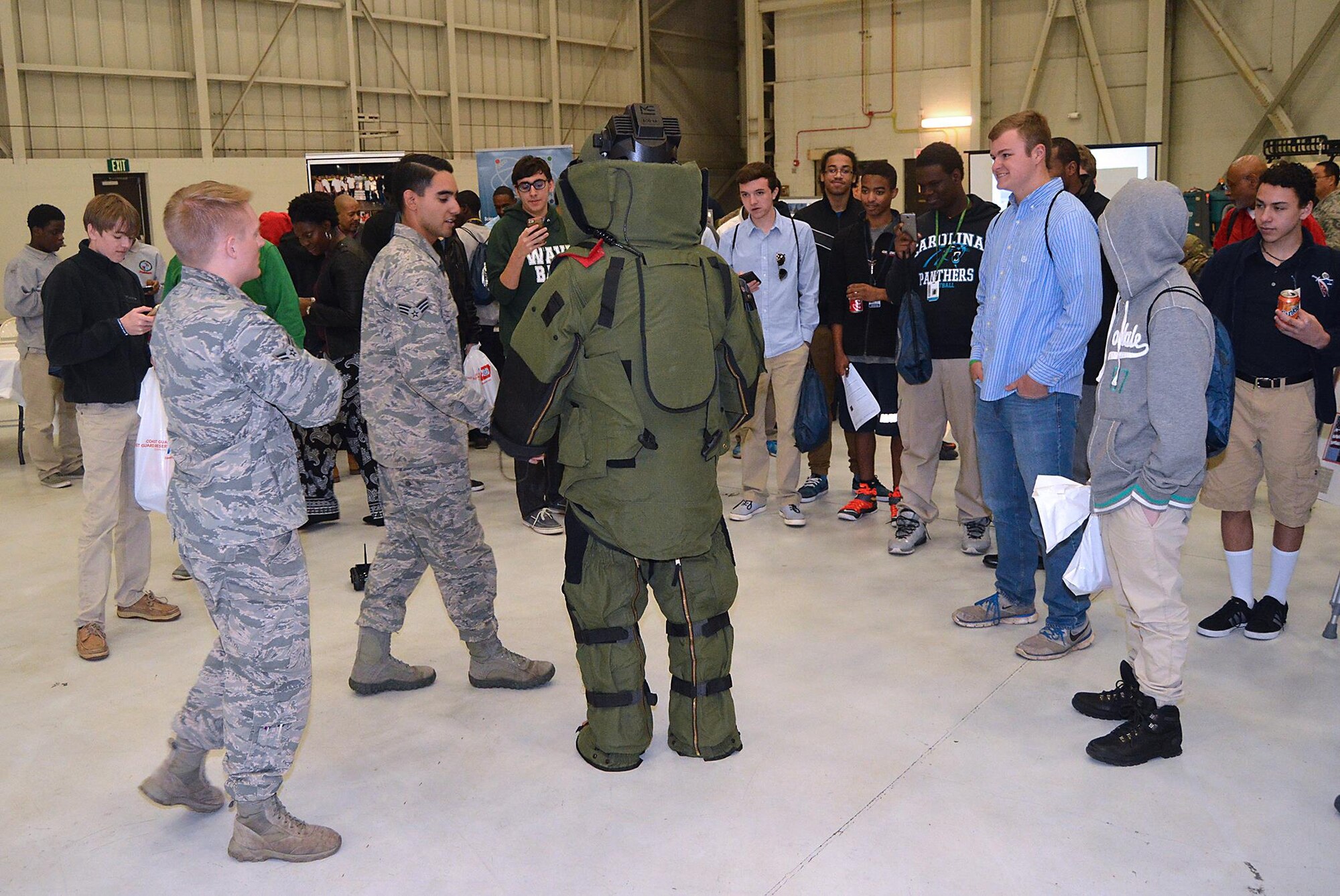 The 628th Airbase Wing's Explosive Ordinance Disposal bomb suit drew a lot of attention at the Joint Base Charleston Tuskegee Airmen Career Day Feb. 25, 2016. The 315th Airlift Wing's first Tuskegee Airmen Career Day drew  over 130 local teenage boys to Joint Base Charleston, S.C. to learn about careers in aviation. The event also celebrated the story of the first black pilots in the American military – the Tuskegee Airmen. (courtesy photo by Senior Master Sgt. Eric Keys)
