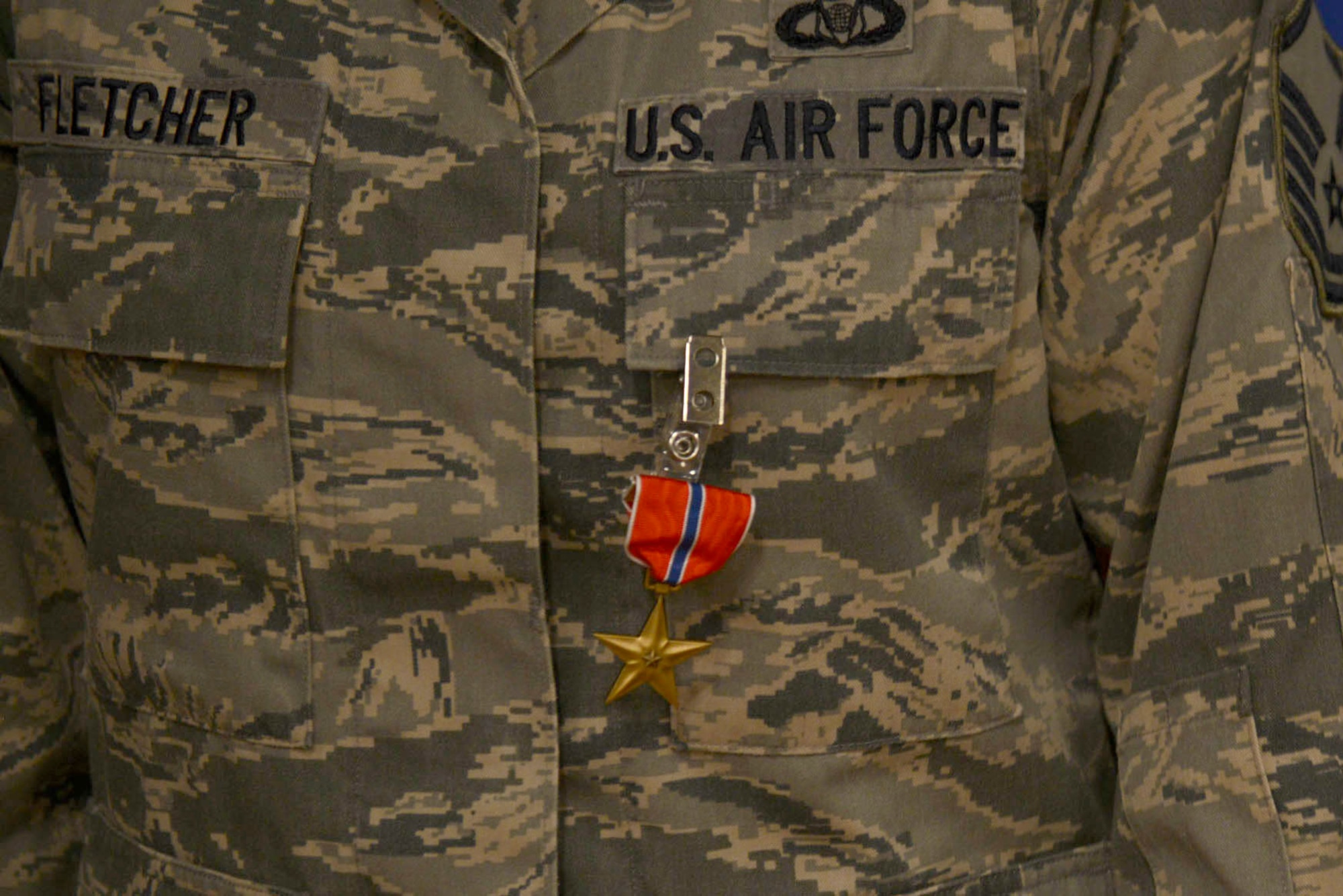 U.S. Air Force Master Sgt. Jennifer Fletcher, 20th Fighter Wing command post superintendent, receives a Bronze Star medal from Lt. Gen. Charles Q. Brown Jr., commander, U.S. Air Forces Central Command, at Shaw Air Force Base, S.C., Feb. 29, 2016. Fletcher received the Bronze Star medal for outstanding meritorious achievements during a recent deployment in support of Operation Freedom’s Sentinel. (U.S. Air Force photo by Airman 1st Class Christopher Maldonado) 