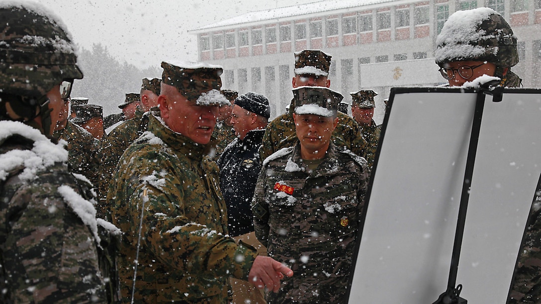 Lt. Gen. Larry D. Nicholson, III Marine Expeditionary Force Commanding General, learns about various Republic of Korea Marine Corps weapon systems during a tour of the 1st ROK Marine Division in Pohang, South Korea, Feb. 24, 2016. More than 60 Marines and sailors with III MEF, III MEF subordinate commands and adjacent commands based in Japan and South Korea, met in the South in order to uphold and strengthen the alliance between the ROK and the U.S., and reinforce their commitment to defend the country at a moment’s notice. The visit took place in various locations throughout the country, enhancing U.S. Marines' familiarization of the Korean Peninsula while simultaneously developing the kind of faith and trust between forces that can only be established through constant engagement, as well as rigorous and realistic training.