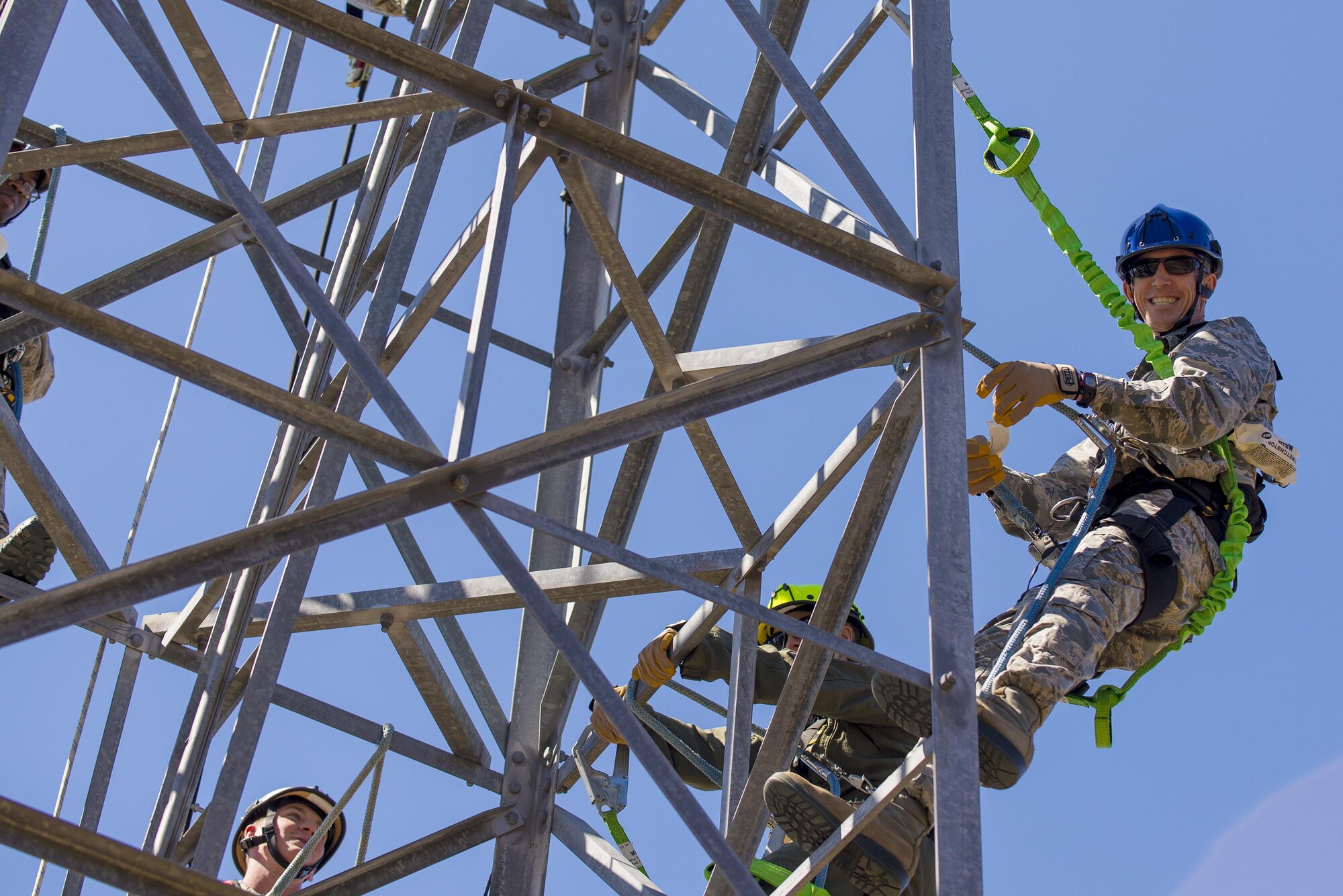 U.S. Air Force Col. Thomas Kunkel, 23d Wing commander, climbs an antenna tower during a visit to the ground air transmit receiver site, Feb. 26, 2016, at Moody Air Force Base, Ga. During the visit, 23d Operations Support Squadron Airmen showcased their mission capabilities and gave Kunkel a firsthand look at how they often climb the towers for routine maintenance. (U.S. Air Force photo by Airman Daniel Snider/Released)