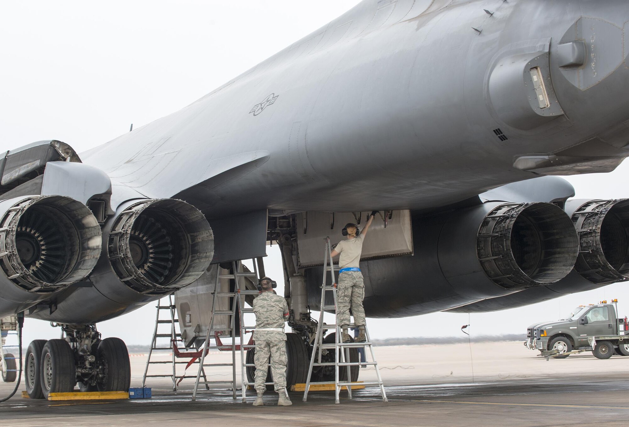 Airmen assigned to the 7th Maintenance Group prep a B-1B Lancer’s bomb bay for a Joint Air-to-Surface Standoff Missile Feb. 21, 2016, at Dyess Air Force Base, Texas, during a B-1 Combat Mission Effectiveness Exercise. The exercise challenged Airmen assigned to the 7th Bomb Wing to prepare six B-1s to launch with weapons and deploy the aircraft and personnel within 48 hours. (U.S. Air Force photo by Airman 1st Class Austin Mayfield/Released)