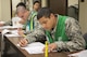 Airmen from the 7th Bomb Wing man the Deployment Control Center processing line Feb. 23, 2016, at Dyess Air Force Base, Texas, during a B-1 Combat Mission Effectiveness exercise. The DCC is a one-stop shop for Airmen issued a short-notice deployment tasking to ensure they are fully qualified to deploy. Part of the plan for the B-1 CME exercise was to task Airmen in operations, maintenance and support positions to deploy within 48 hours. (U.S. Air Force photo by Airman 1st Class Austin Mayfield/Released)