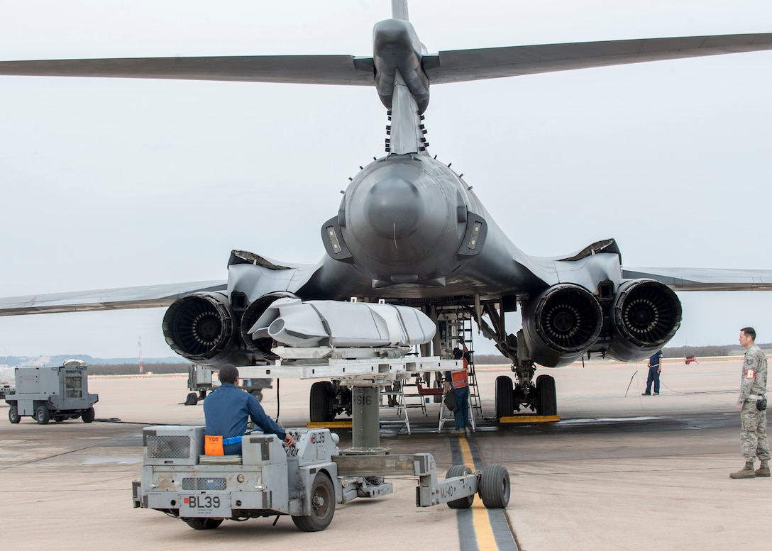 Airmen assigned to the 7th Maintenance Group load an inert Joint Air-to-Surface Standoff Missile at Dyess Air Force Base, Texas, in a B-1B Lancer Feb. 21, 2016, during a B-1 Combat Mission Effectiveness exercise. Maintenance personnel had 48 hours to successfully load and prepare to launch six B-1s with JASSM and Joint Direct Attack Munitions in the Lancers’ three bomb bays. Maintenance personnel were successful in launching all six jets and preparing themselves at the same time to deploy within the two-day window to support the aircraft. (U.S. Air Force photo by Airman 1st Class Austin Mayfield/Released)
