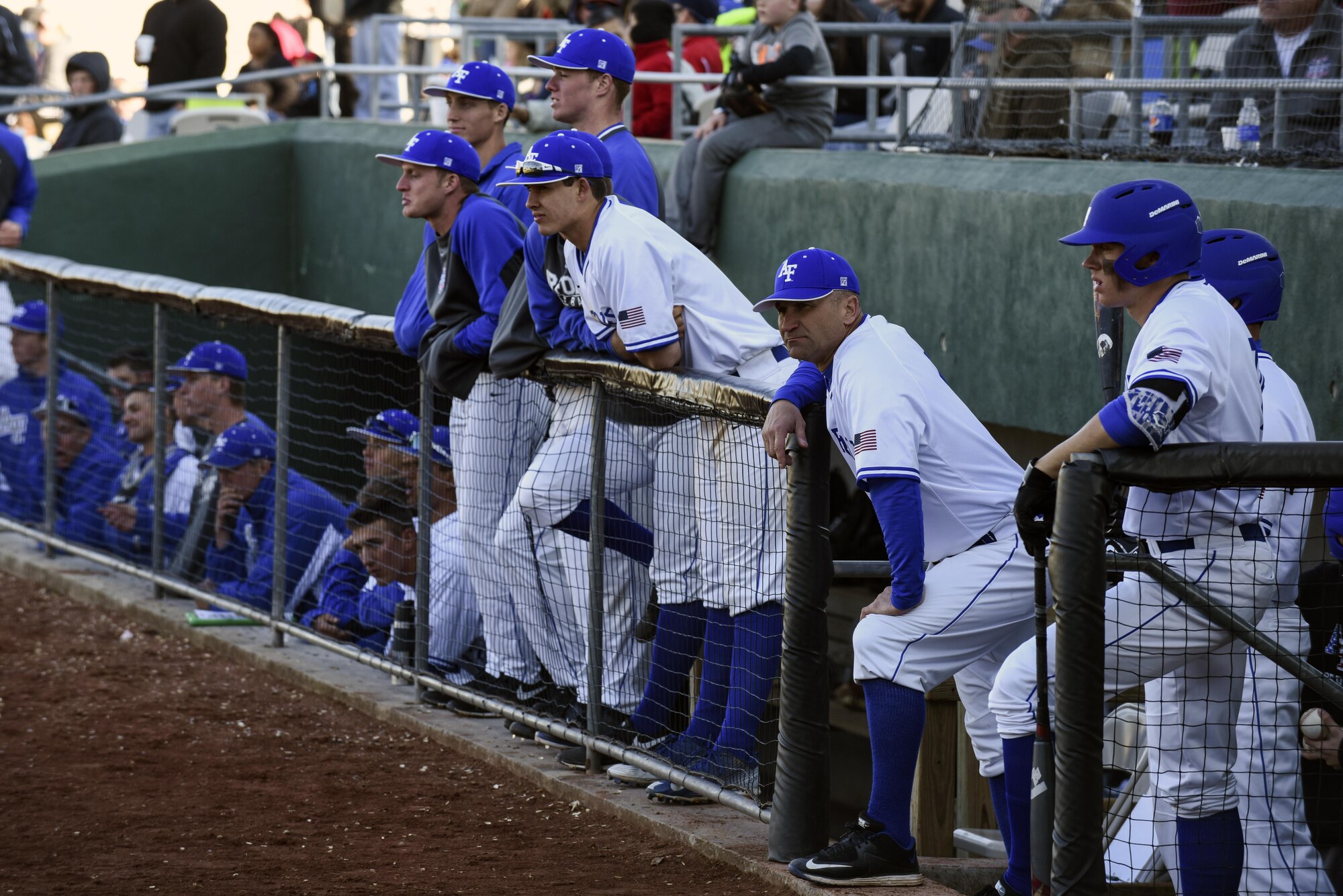 Players from the Air Force Academy watch as one of their team mates goes up to bat, Feb. 27, 2016, in Kinston, North Carolina. Mike Kazlausky, head coach, led the team to victory on day three of the Freedom Classic in a 10-5 win against the Naval Academy. (U.S. Air Force photo/Senior Airman John Nieves Camacho)