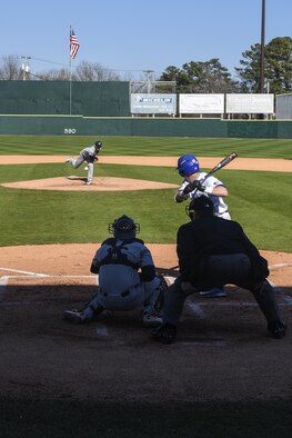 Midshipman George Coughlin, Naval Academy starting pitcher, pitches to Air Force Academy right fielder Cadet Spencer Draws, Feb. 27, 2016, in Kinston, North Carolina. Draws went 0-4 on the day with one strike out. (U.S. Air Force photo/Airman Shawna L. Keyes)  