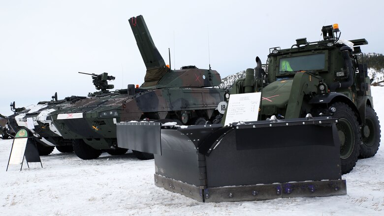 An array of weapons and vehicles sit on display in Namsos, Norway, March 1, 2016, during Distinguished Visitor Day, which marked the official beginning of Exercise Cold Response 16. Distinguished Visitor Day provided high-ranking personnel from all 13 participating countries an overview of the scope, intent and capabilities achieved through integration of personnel and equipment among NATO allies and partners nations. During Cold Response, more than 15,000 troops will work together, learn from each other and sustain and strengthen partnerships, operational capabilities, and coordination.