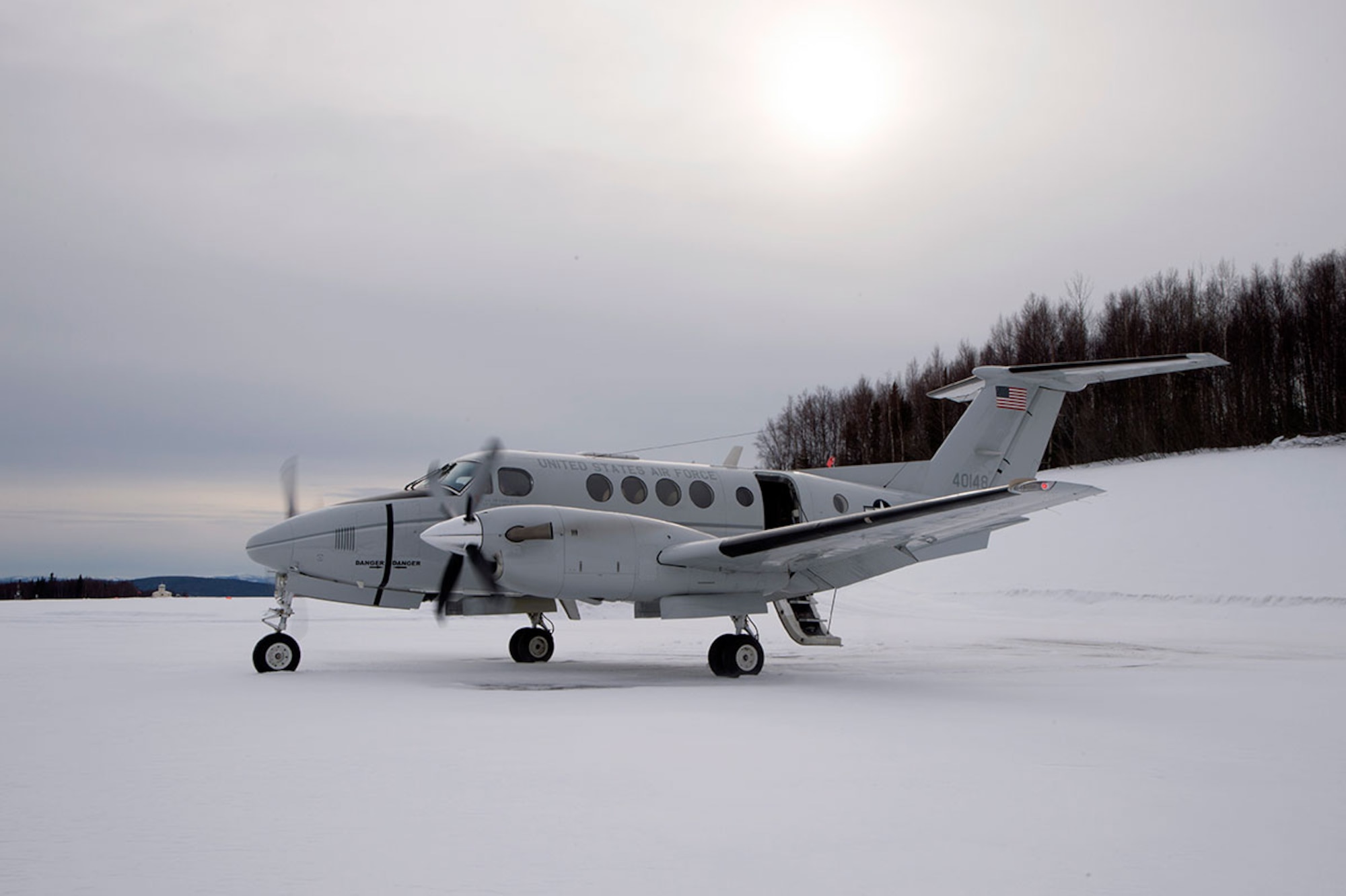 A C-12F Huron assigned to the 517th Airlift Squadron at Joint Base Elmendorf-Richardson, Alaska, waits for passengers to arrive before taking off at Tatalina Air Force Station near McGrath, Alaska, Feb. 23, 2016. Tatalina is a long-range radar site and remains active as part of the Alaska North American Aerospace Defense Command Region. (U.S. Air Force photo/Staff Sgt. Sheila deVera)