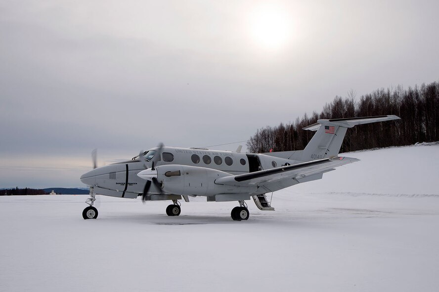 A C-12F Huron assigned to the 517th Airlift Squadron at Joint Base Elmendorf-Richardson, Alaska, waits for passengers to arrive before taking off at Tatalina Air Force Station near McGrath, Alaska, Feb. 23, 2016. Tatalina is a long-range radar site and remains active as part of the Alaska North American Aerospace Defense Command Region. (U.S. Air Force photo/Staff Sgt. Sheila deVera)