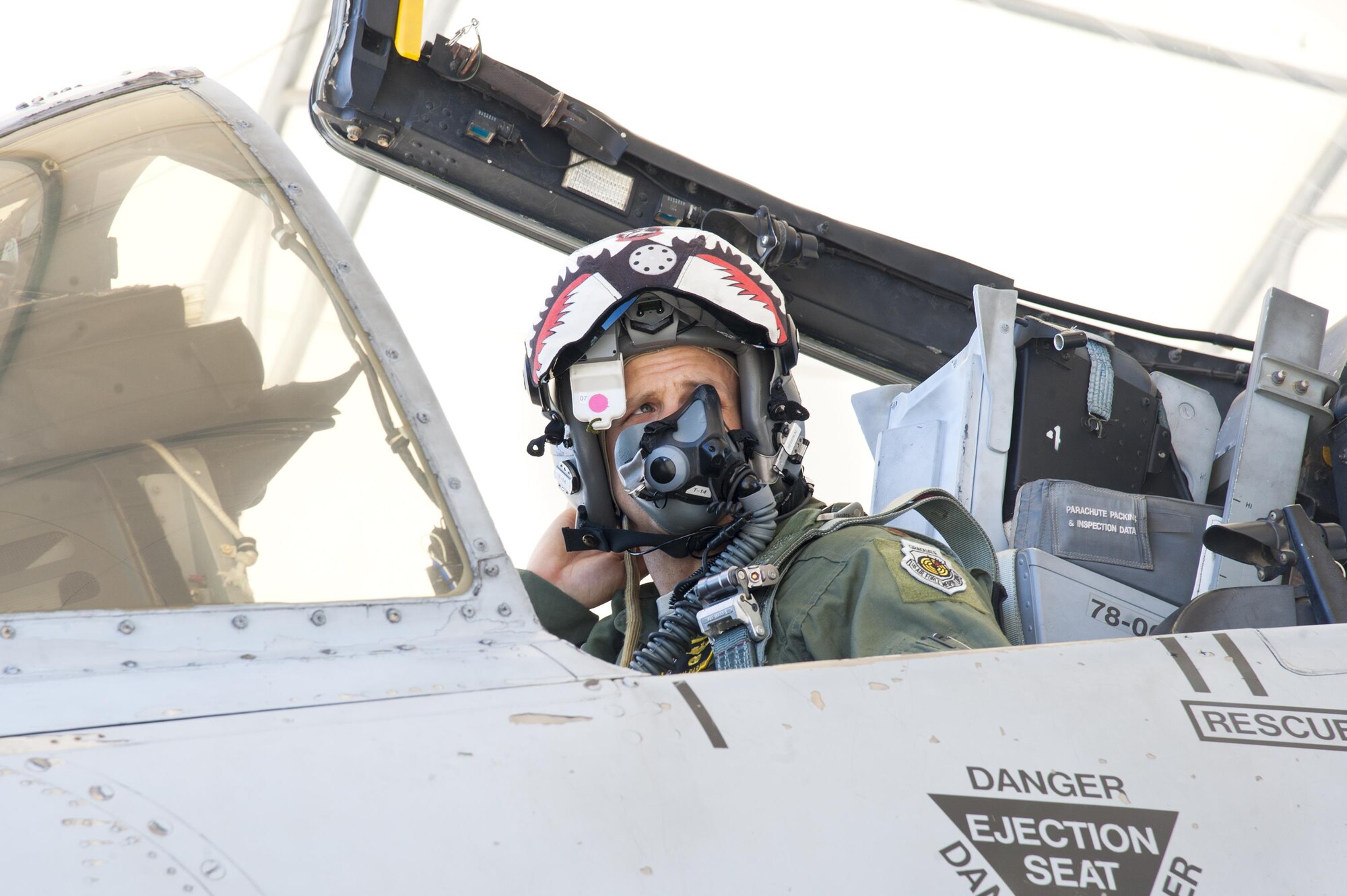 U.S. Air Force Maj. Jeremiah Parvin, 23d Wing chief of safety, conducts preflight checks in preparation for a flight, Feb. 18, 2016, at Moody Air Force Base, Ga. Multiple U.S. Air Force aircraft within Air Combat Command conducted joint aerial training at Grand Bay Bombing and Gunnery Range. During the training, the aircraft conducted tactical air and ground maneuvers, as well as weapons training. (U.S. Air Force photo by Andrea Jenkins/Released)