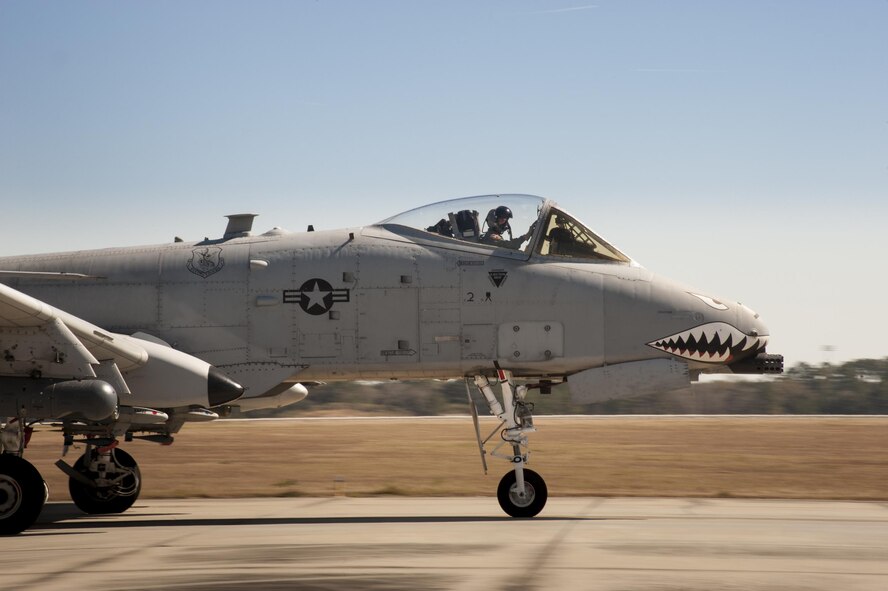 A 23d Fighter Group A-10 Thunderbolt II attack aircraft taxis down the flightline, Feb. 18, 2016, at Moody Air Force Base, Ga. Multiple U.S. Air Force aircraft within Air Combat Command conducted joint aerial training at Grand Bay Bombing and Gunnery Range. During the training, the aircraft conducted tactical air and ground maneuvers, as well as weapons training. (U.S. Air Force photo by Andrea Jenkins/Released)
