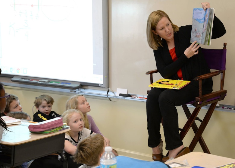 Laura Lokey-Flippo, U.S. Army Engineering and Support Center, Huntsville Base Operations program manager, reads Dr. Seuss' "The Lorax" March 1, to Horizon Elementary School third graders during the National Education Association's Read Across America event.